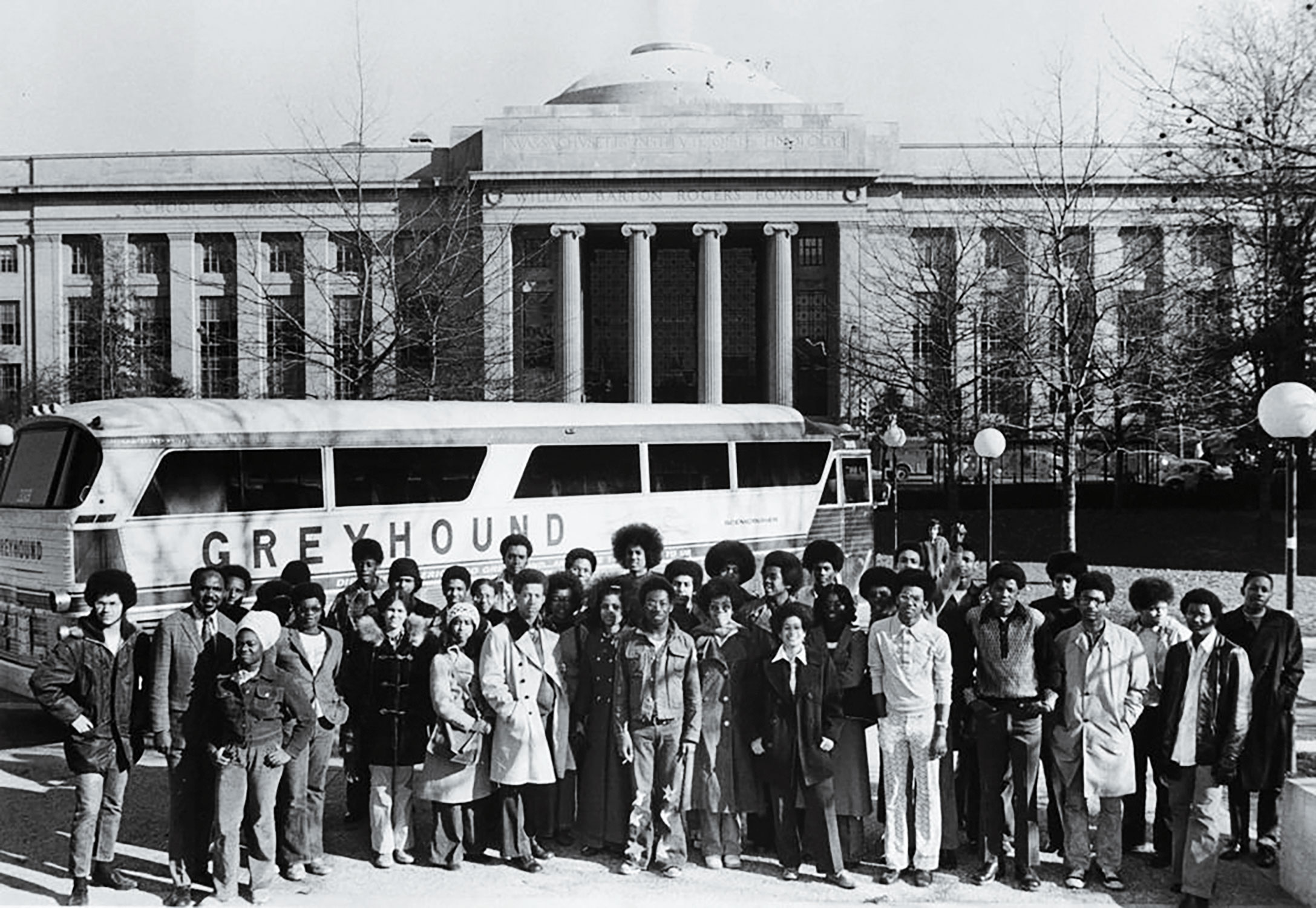 Black and white photo of group of students in front of the MIT Dome