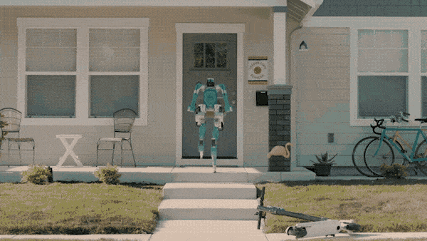 A robot delivering a package to a door