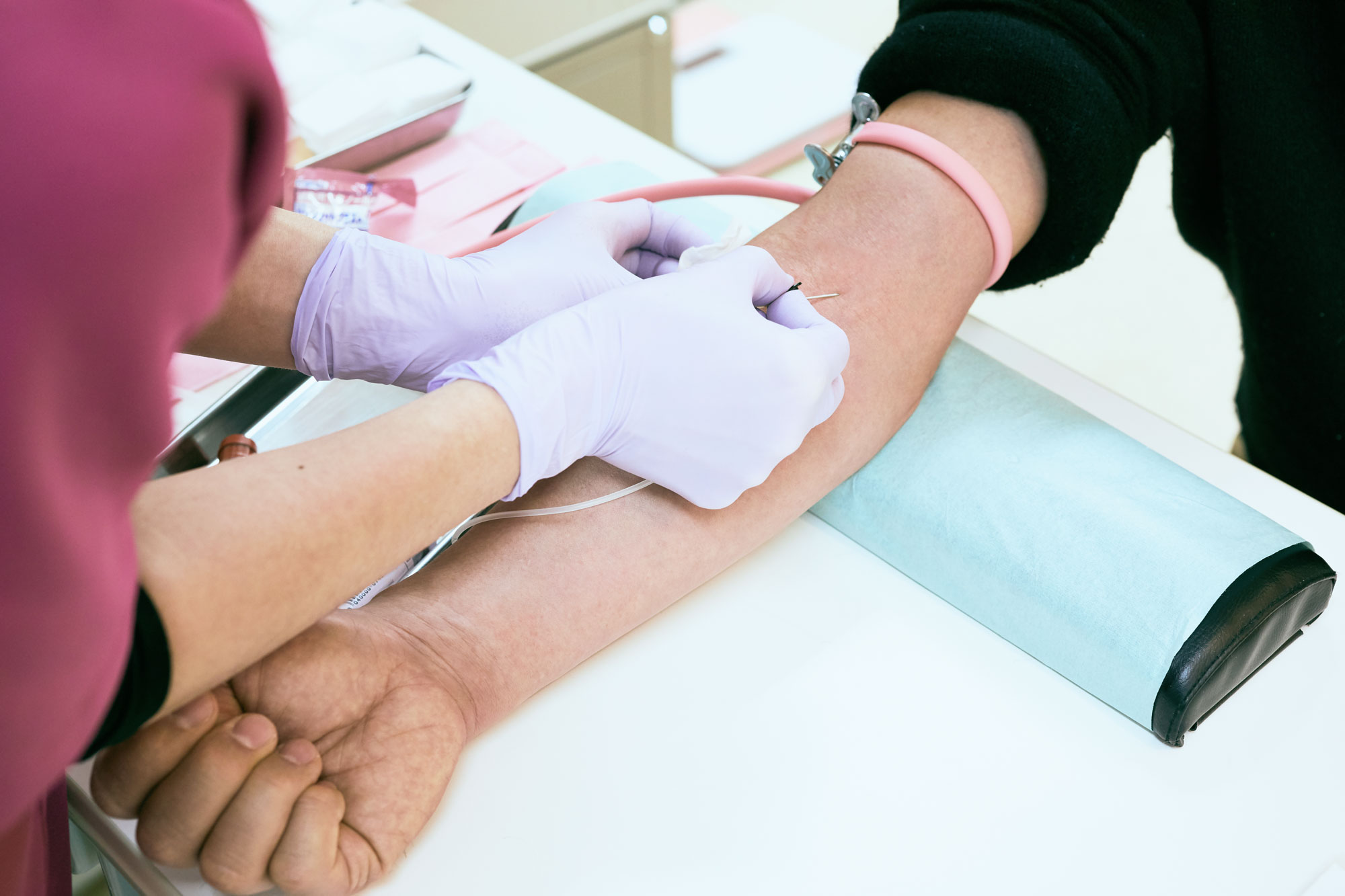 An image of a patient having their blood drawn