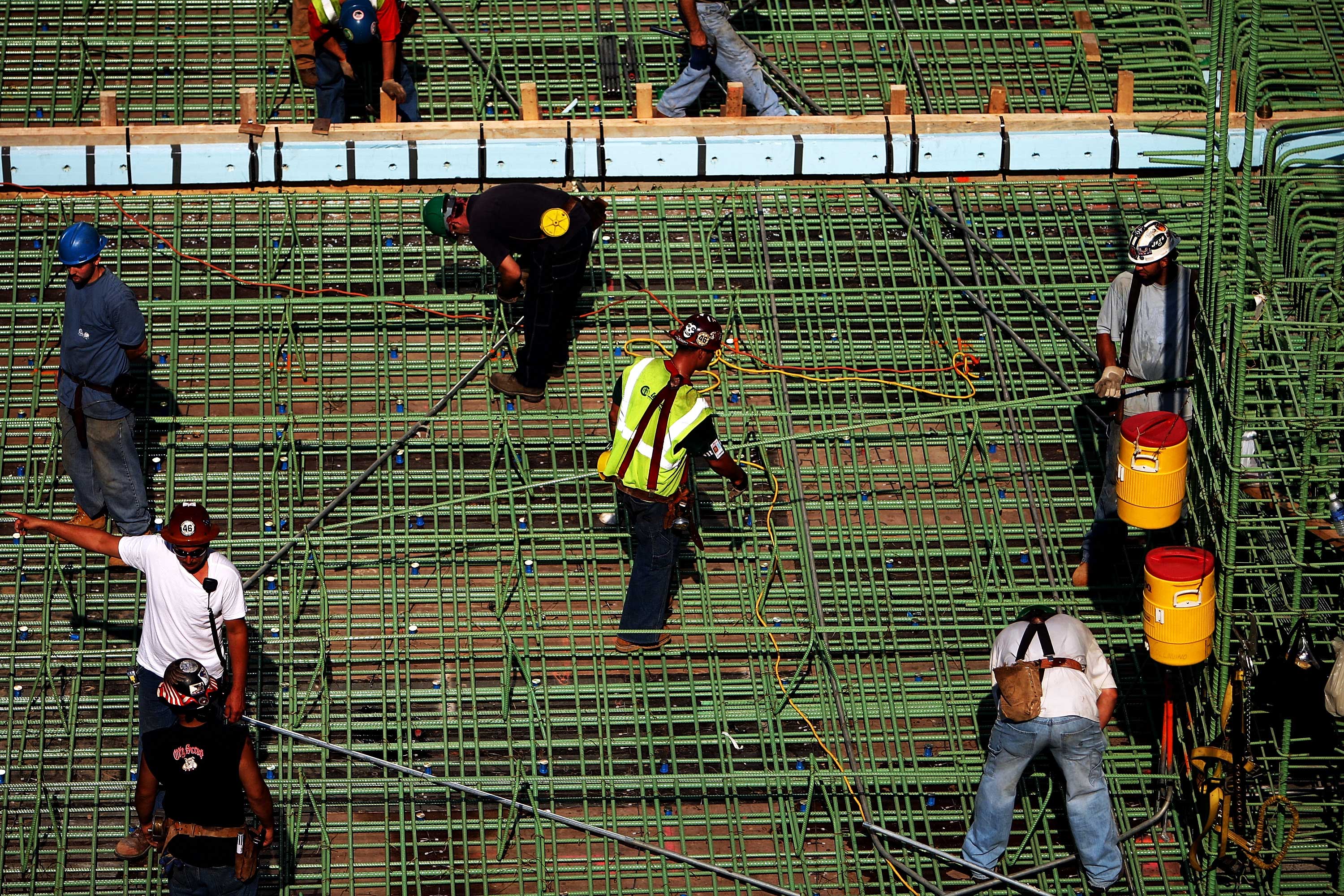 An image of construction workers