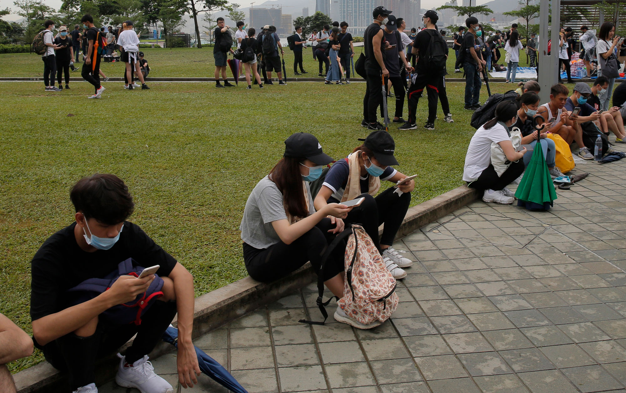 Protesters in Hong Kong on their smartphones
