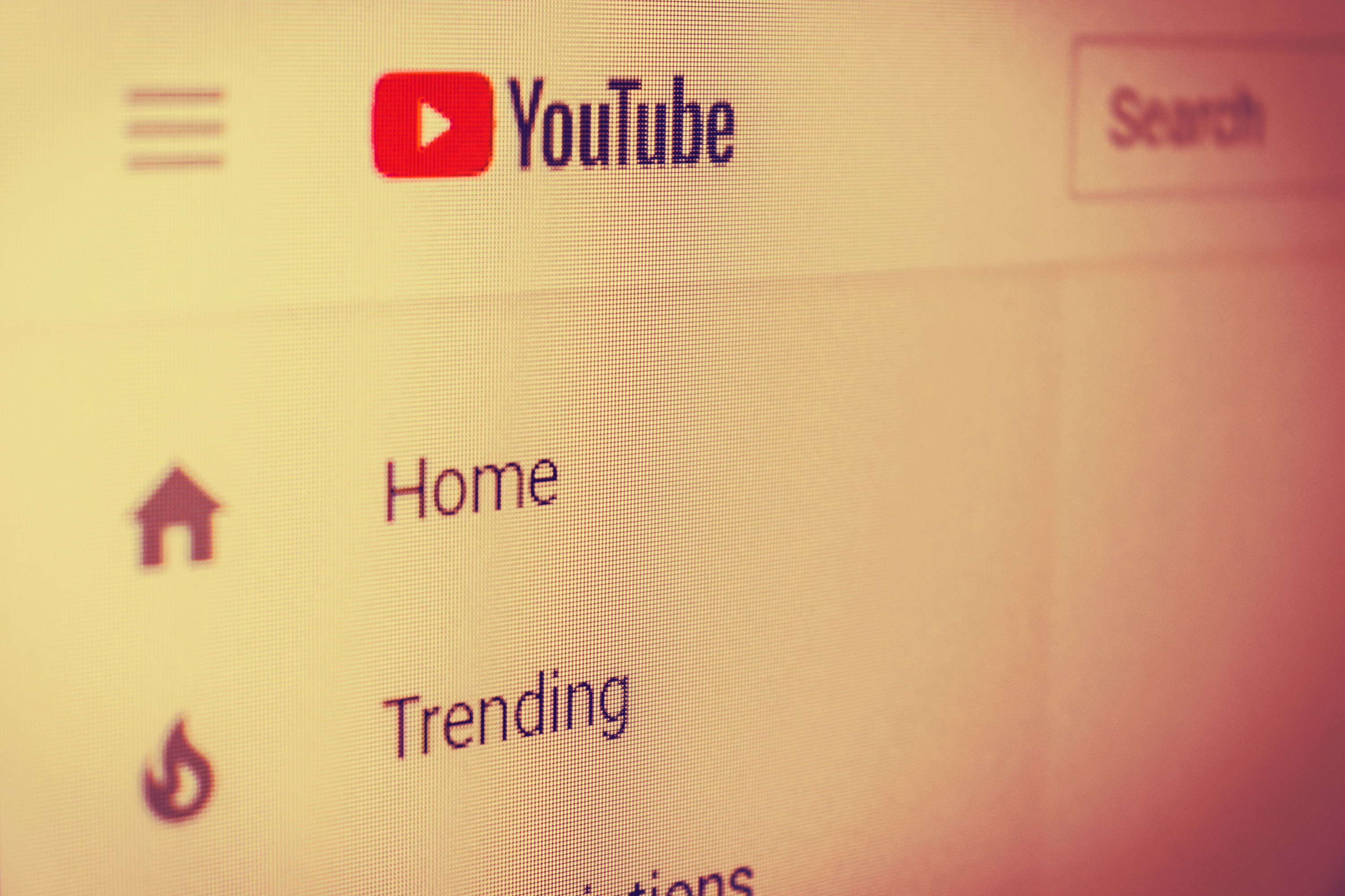 A photo showing part of YouTube&#039;s user interface and logo