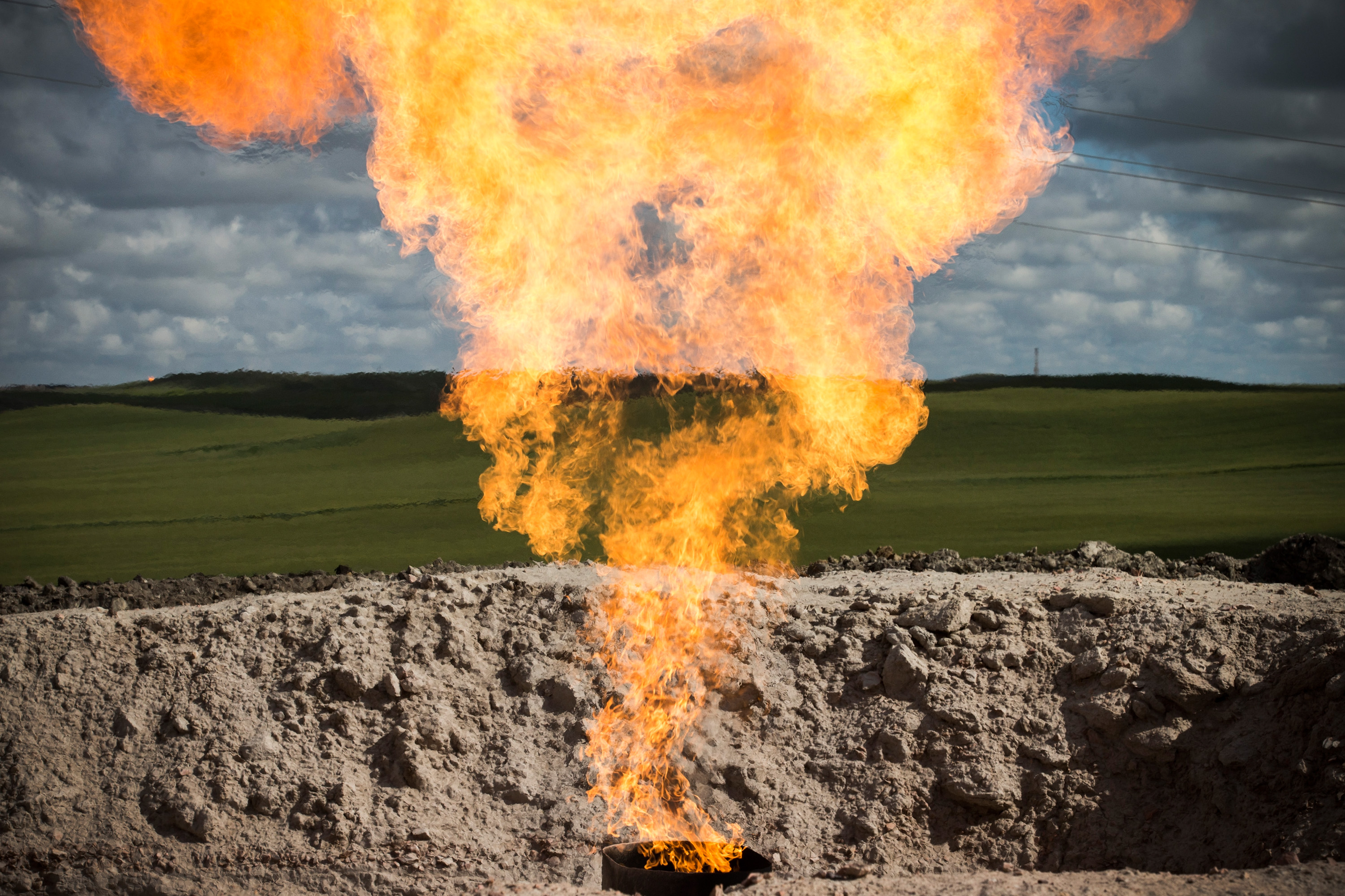 Flaring methane at a fuel extraction site.