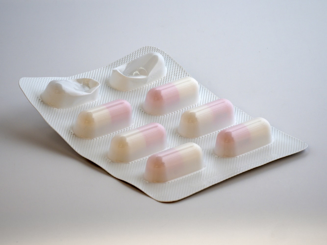 image of pink and white blister package pills