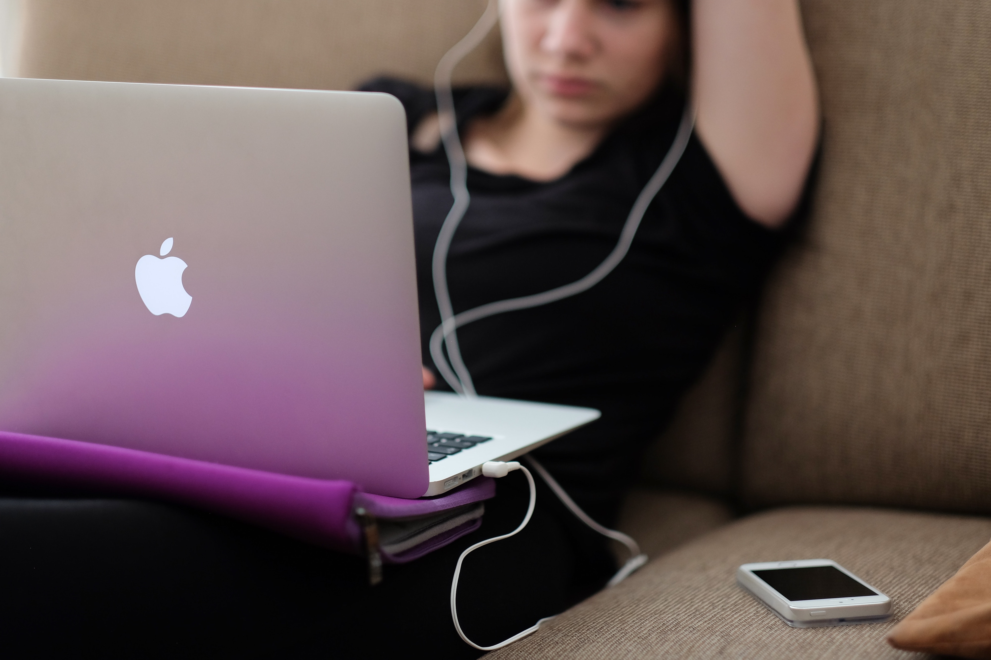 image of teen young woman girl using computer and phone apple imac