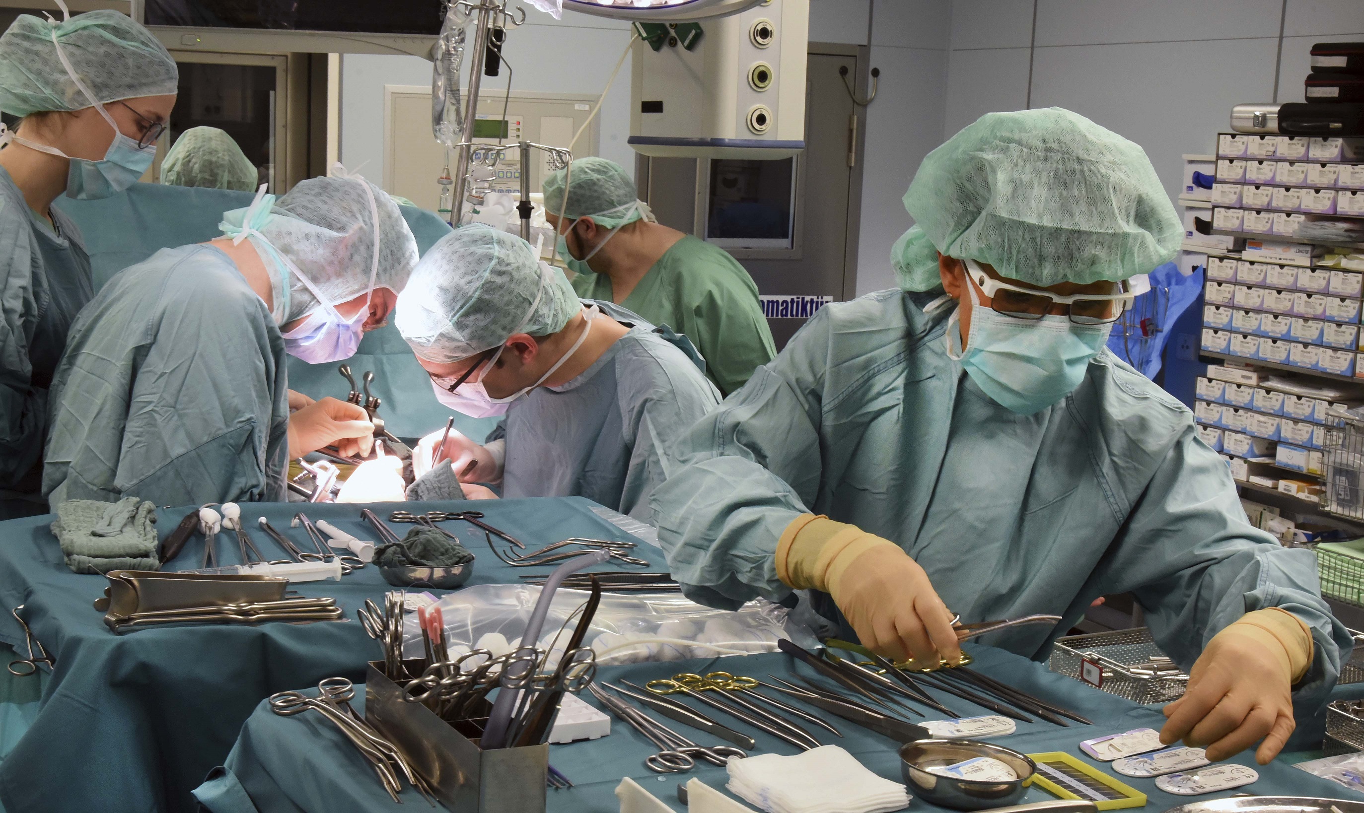 Doctors working on a transplant