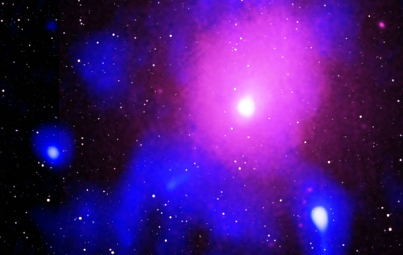 A composite X-ray, Radio, and Infrared image of a gigantic explosion in the Ophiuchus Galaxy Cluster