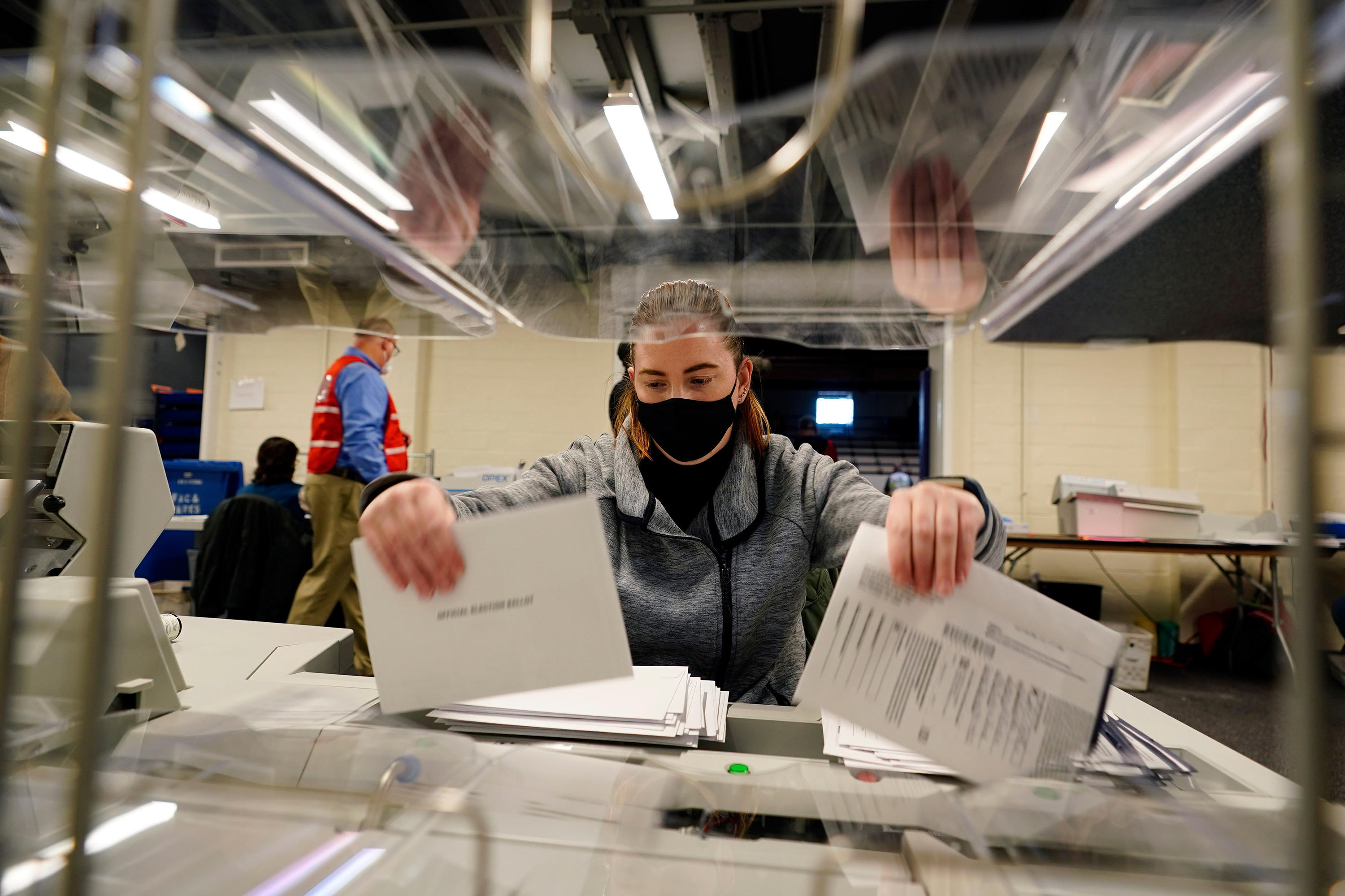 image of woman counting vote in philadelphia livestream election 2020 PA vote tally