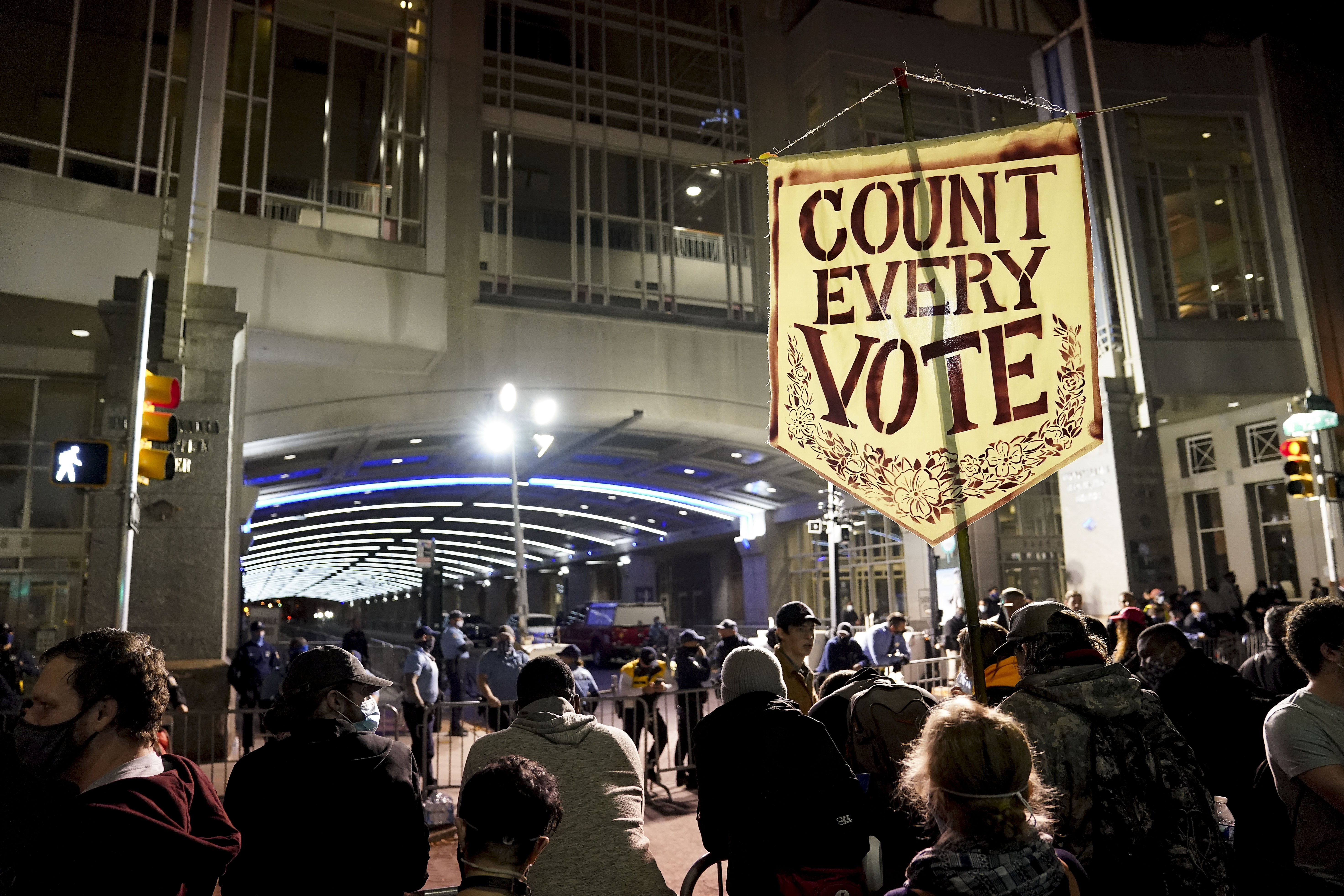 Demonstrators rally outside the Pennsylvania Convention Center where votes are being counted. 