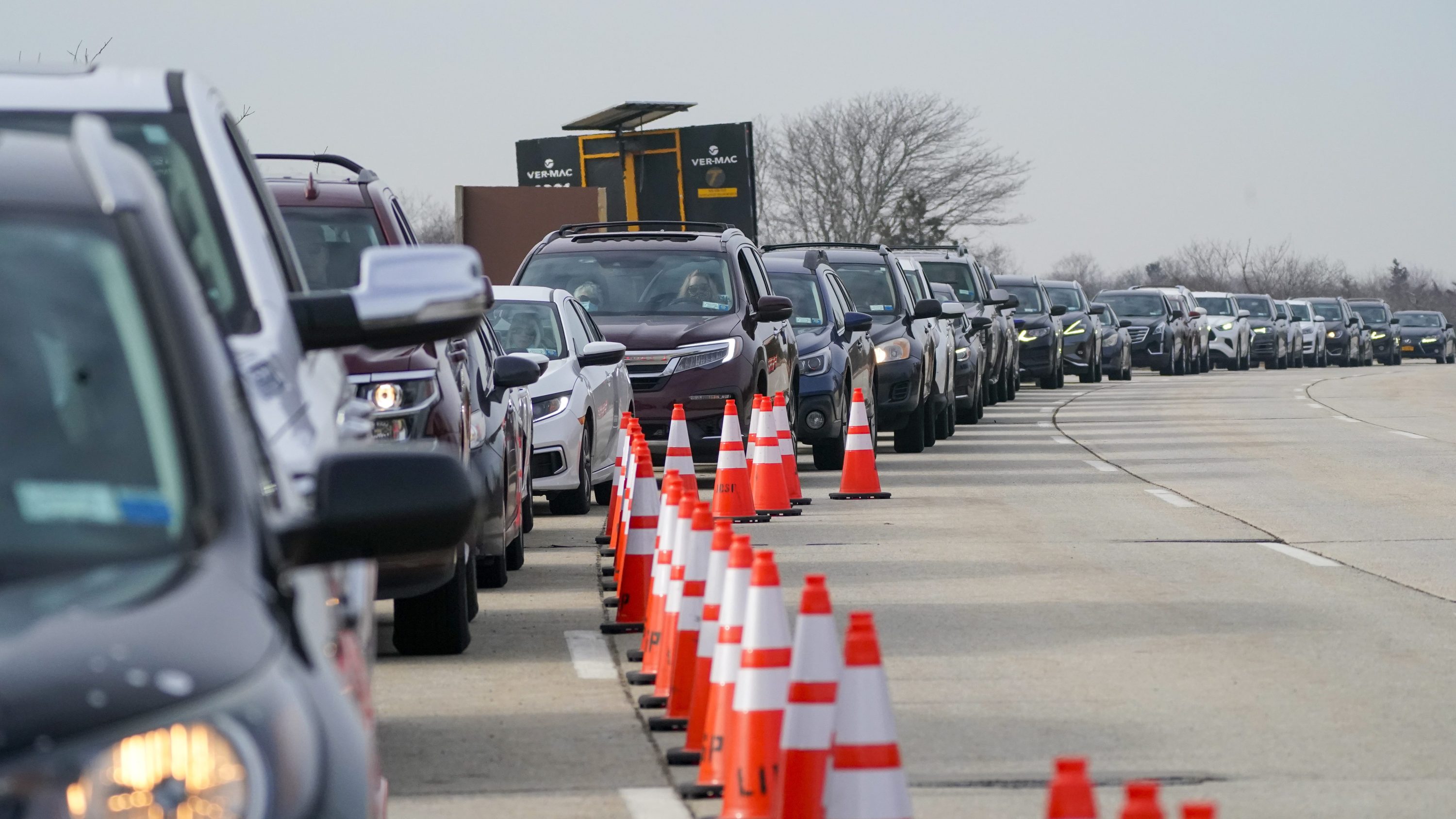 Cars line up in Wantagh, NY for the covid-19 drive-through vaccination site.