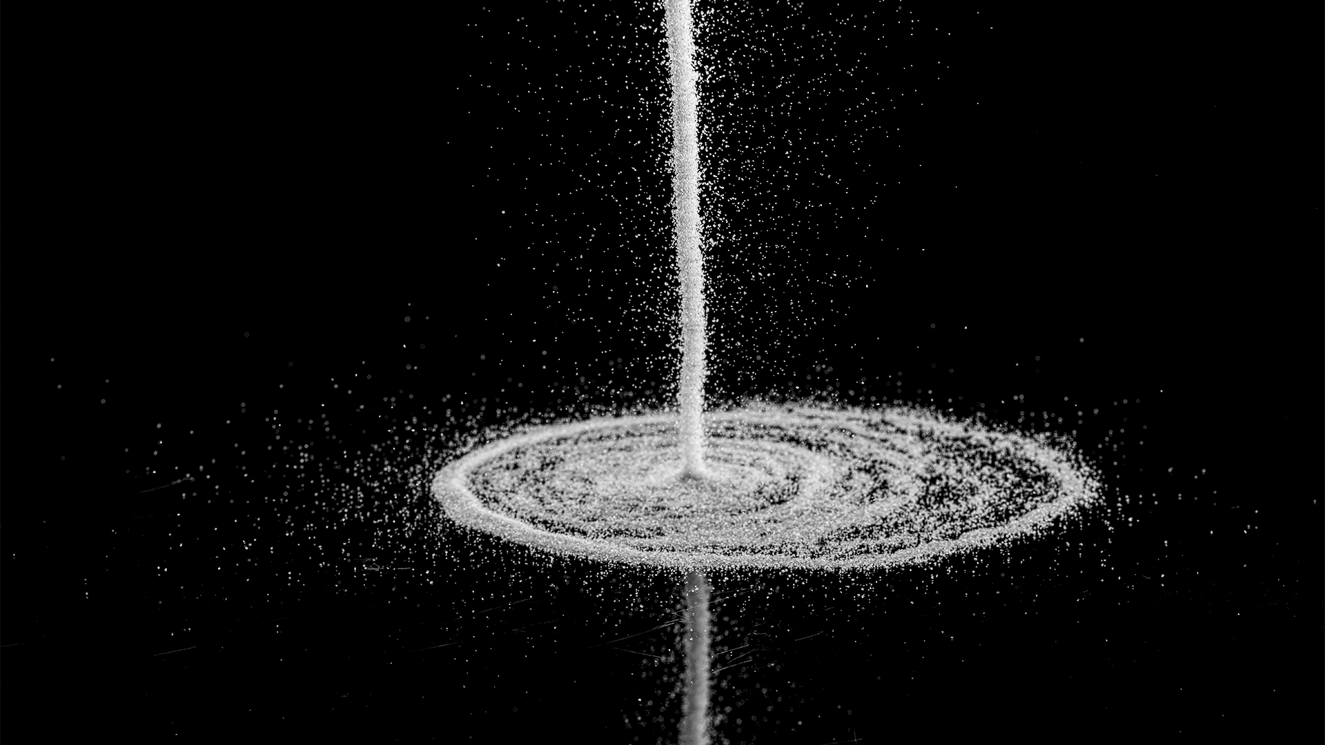 pouring a pile of sugar