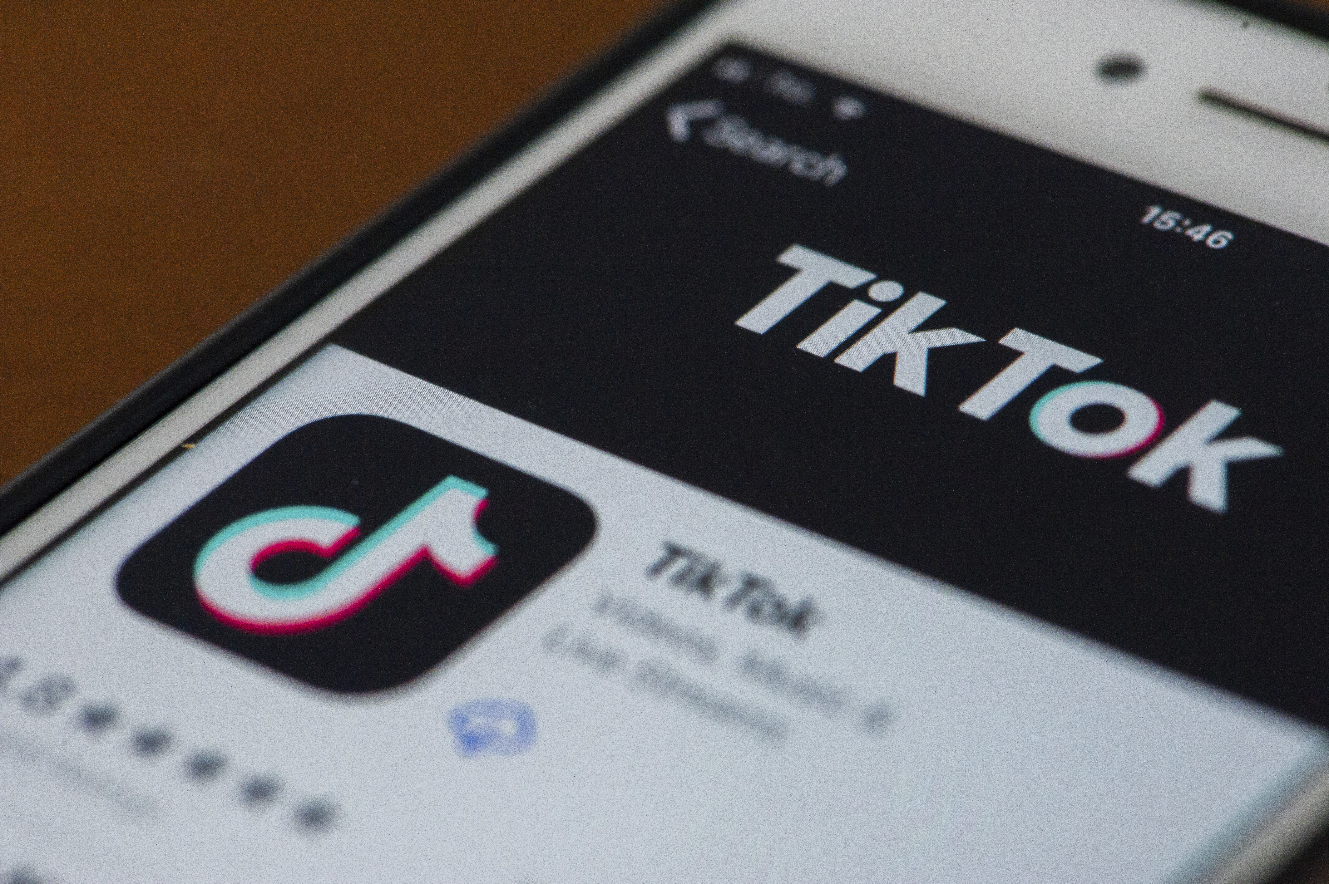 An user opening TikTok on his iPhone