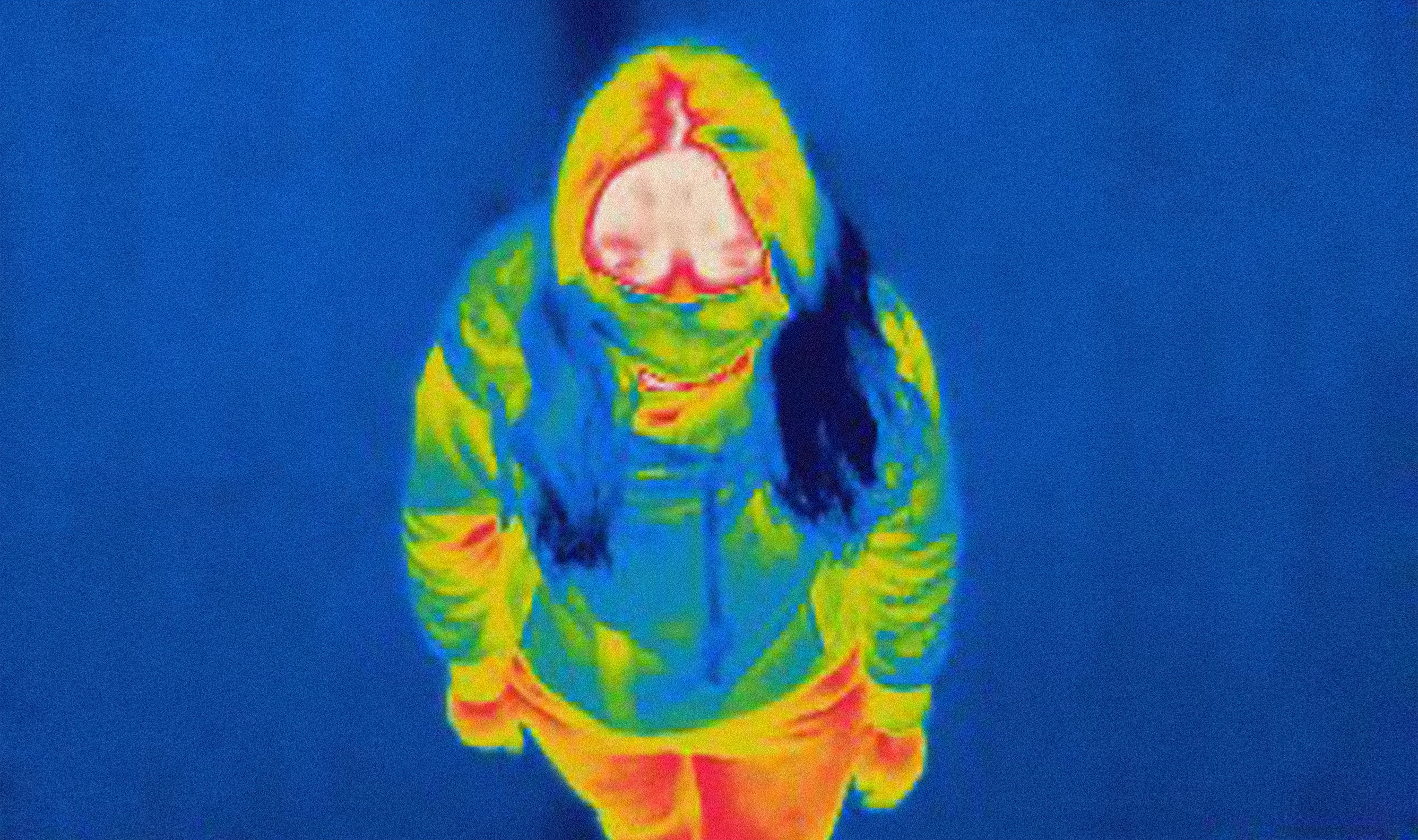 thermal image of young woman wearing mask