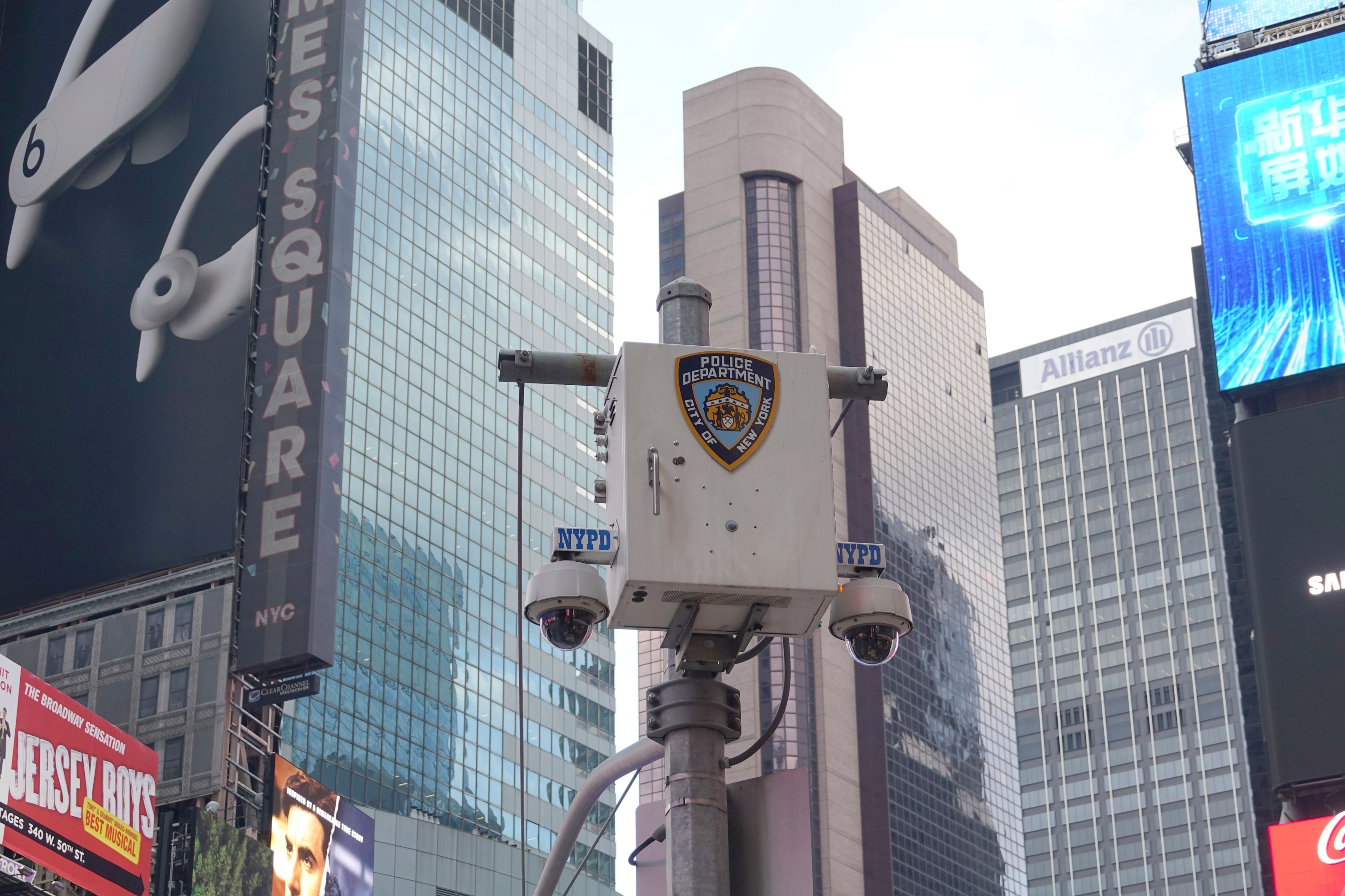 09 September 2019, US, New York: The logo of the New York City Police Department (NYPD) stands on a surveillance camera near Times Square.