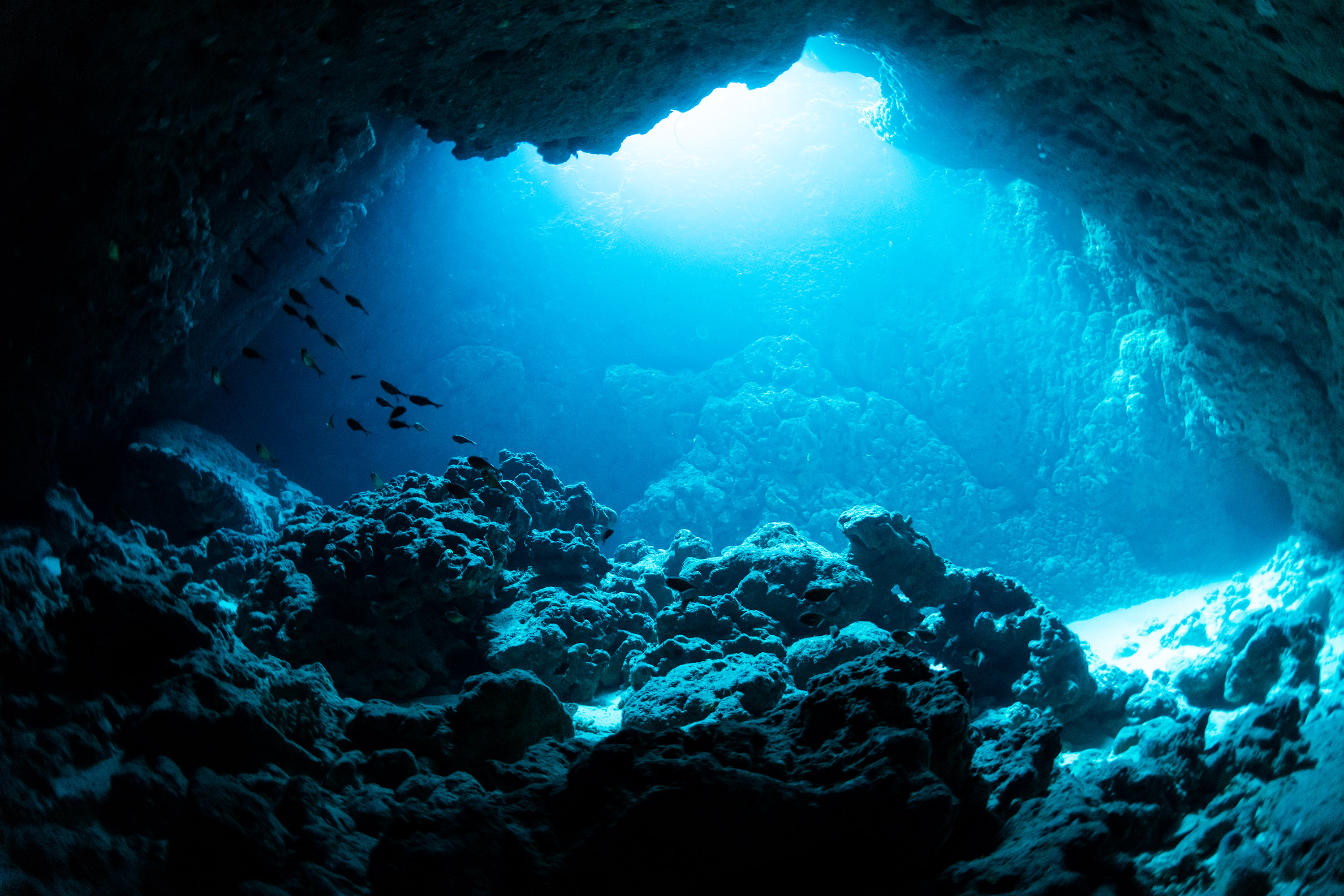 Rays of sunlight into the underwater cave in Miyakojima Island.