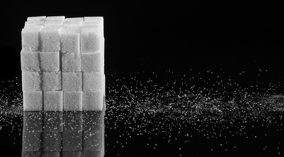 sugar cubes divided into piles