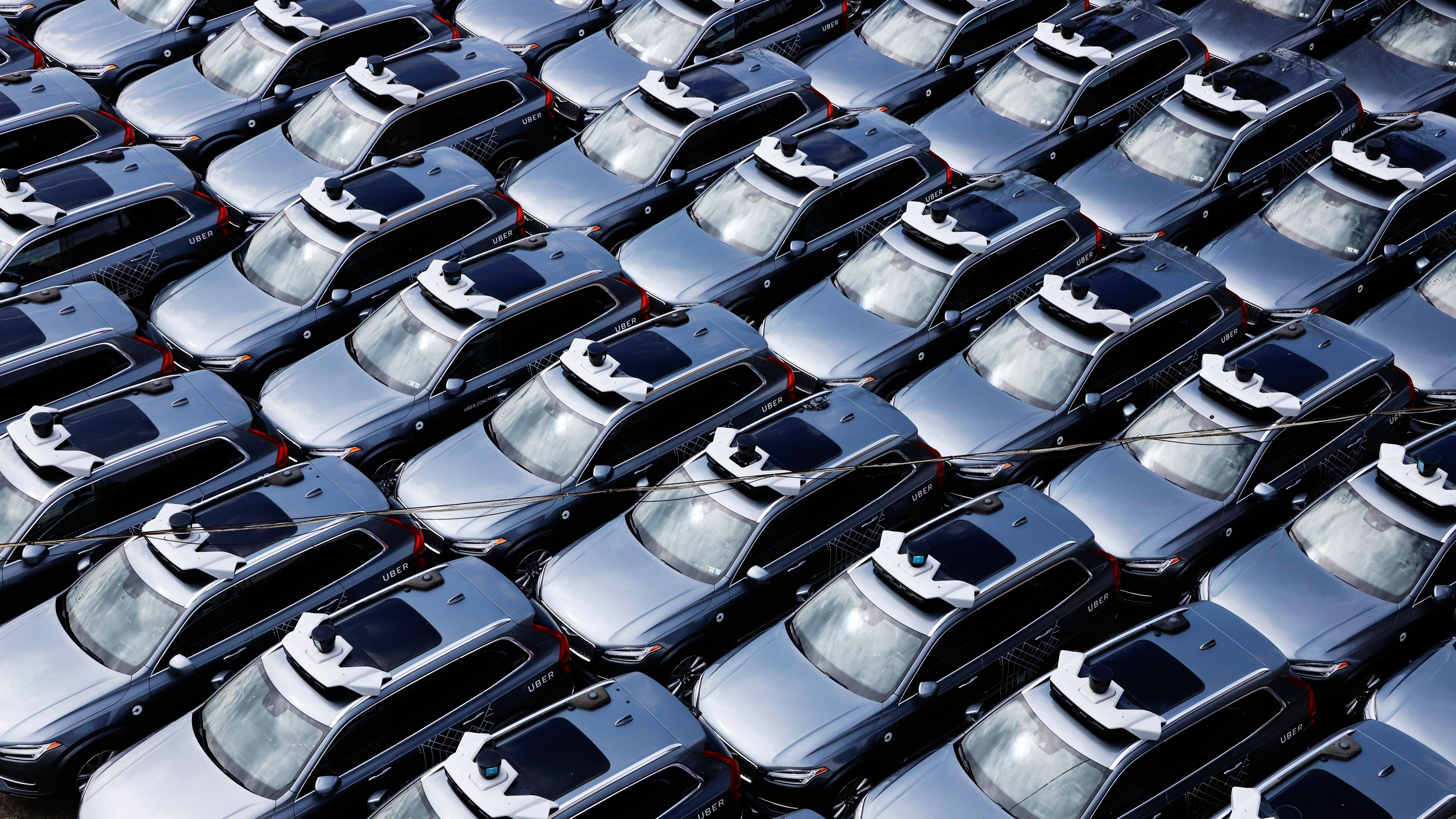 Uber Autonomous Vehicles parked in a lot