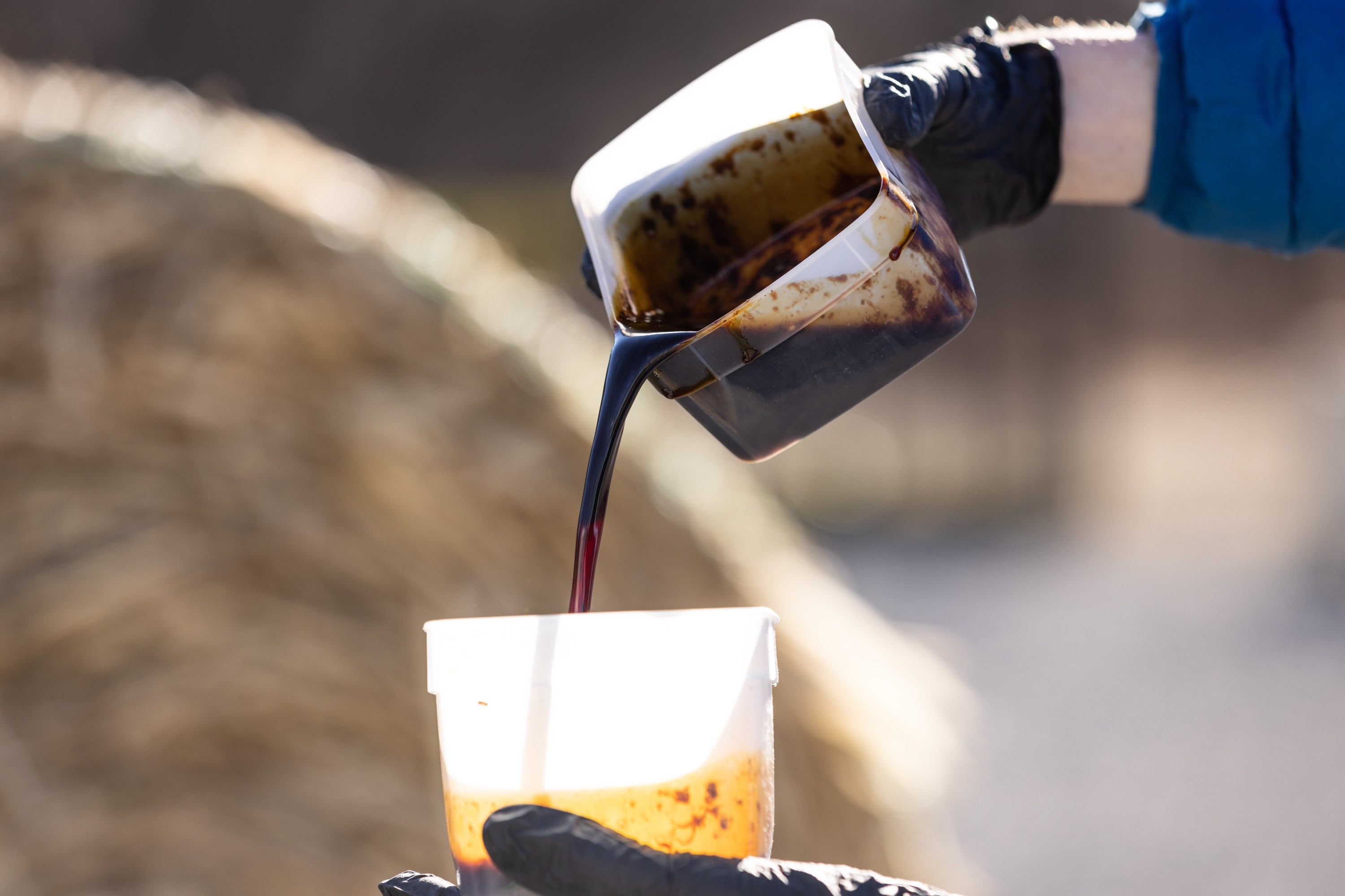 pouring bio oil