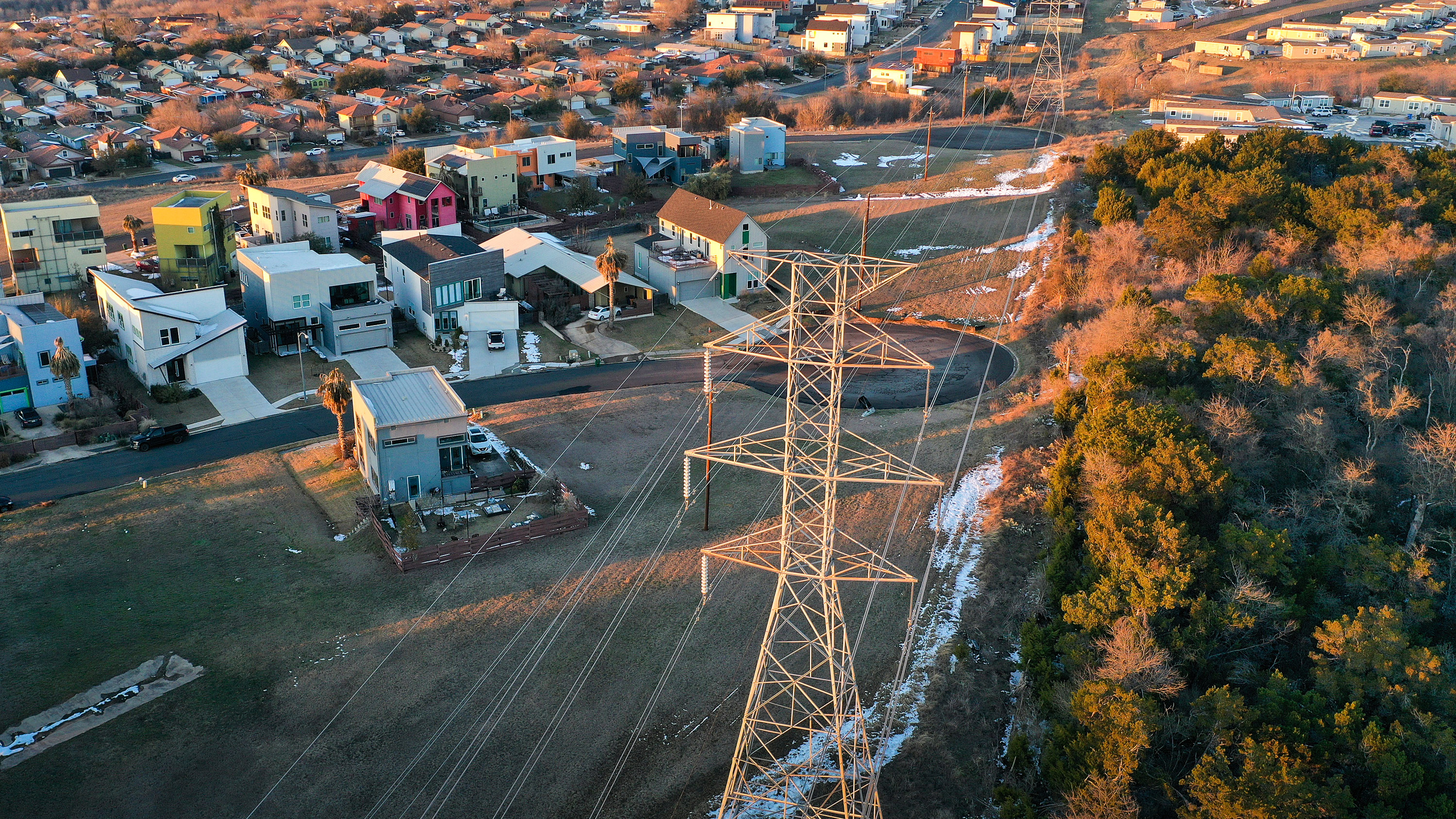 Aerial view of electrical lines running through a neighborhood on February 19, 2021 in Austin, Texas.