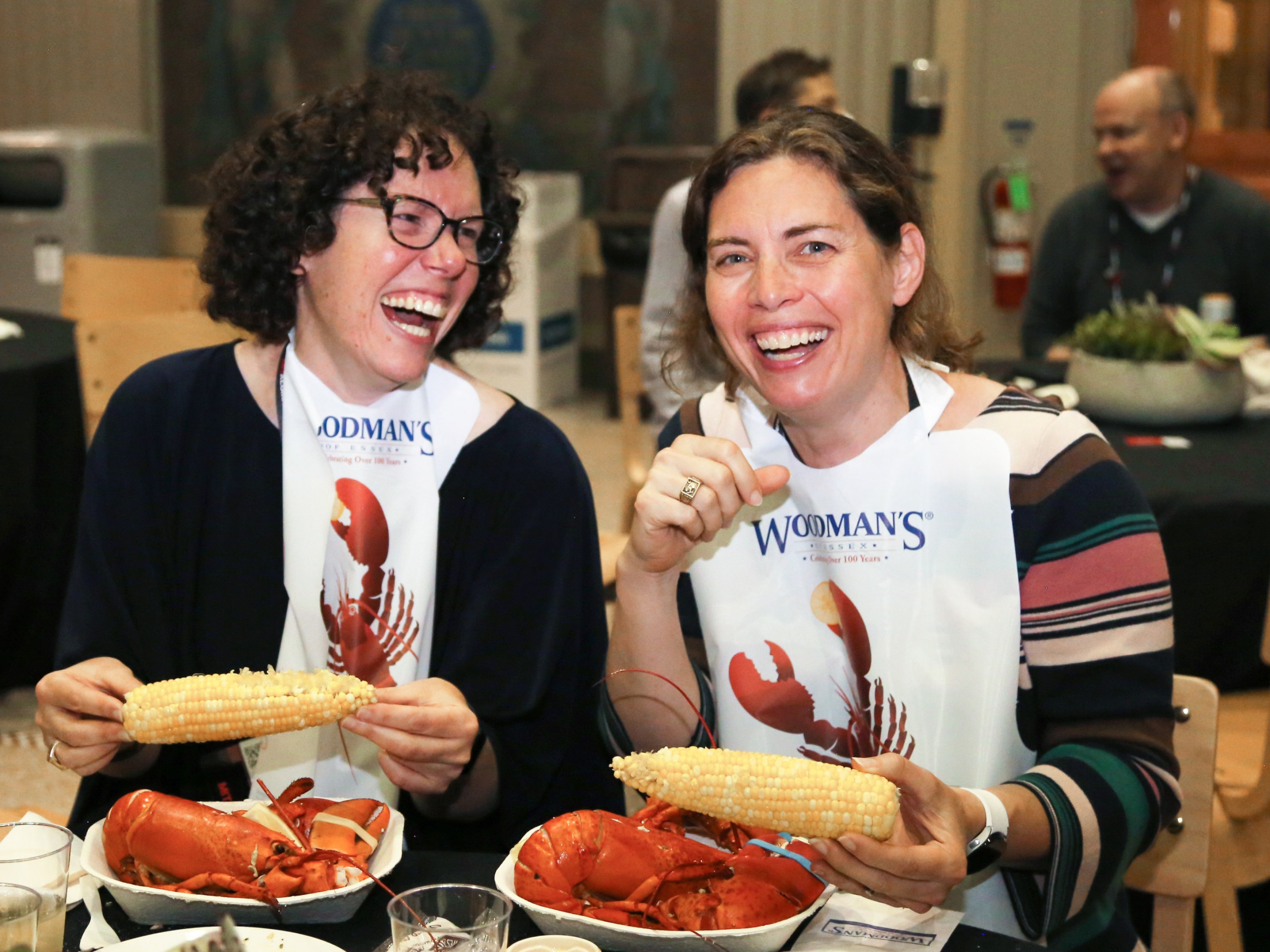 Emily Jamieson ’97 (left) and Stefanie Lemon ’97 wearing lobster bibs
