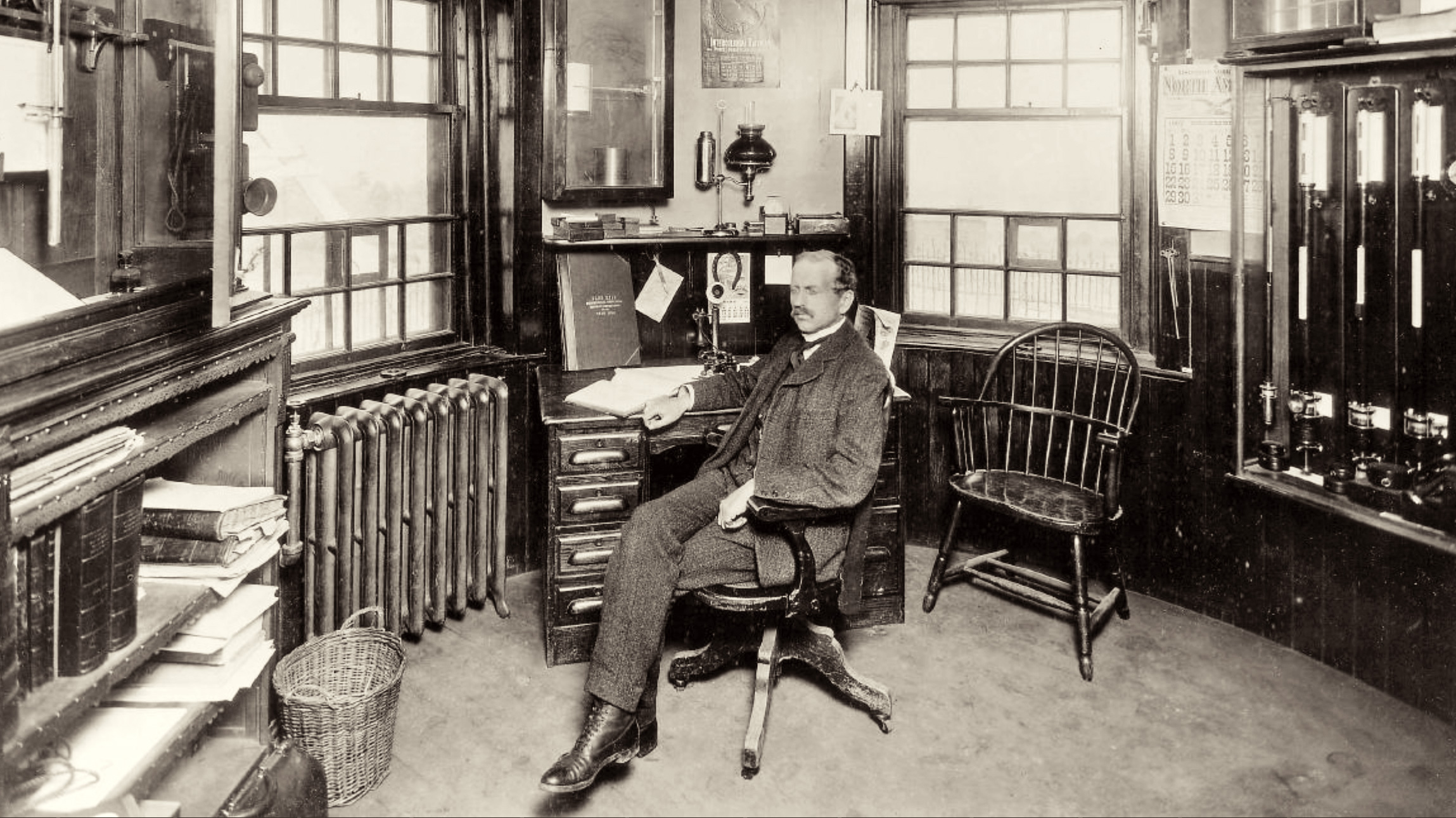 Lawrence Rotch sitting at his desk