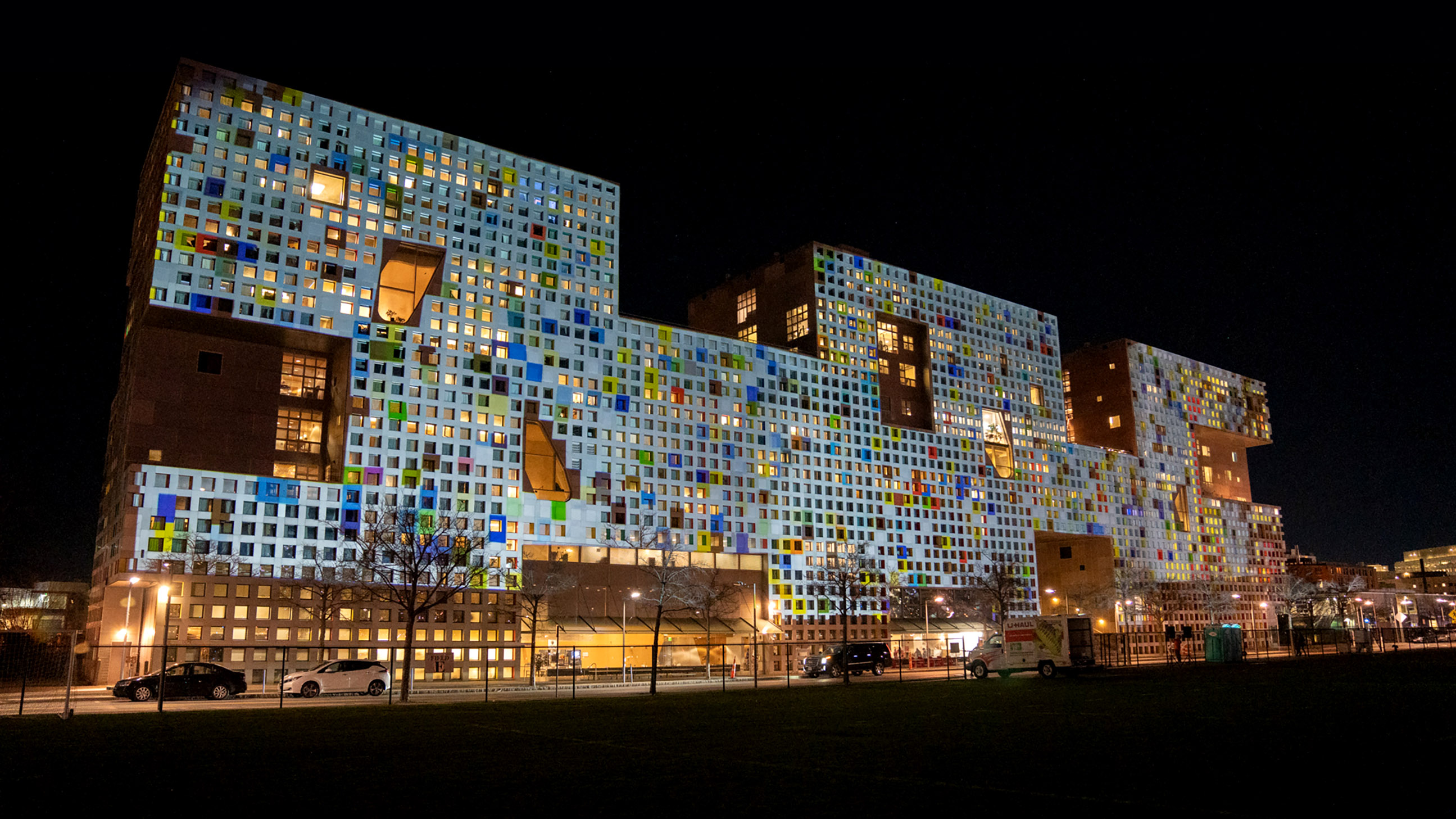 Simmons Hall at night with projection
