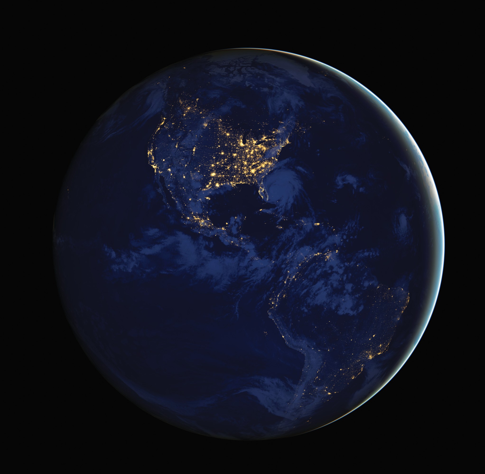 satellite view of Earth in hemisphere away from sun with visible city lights