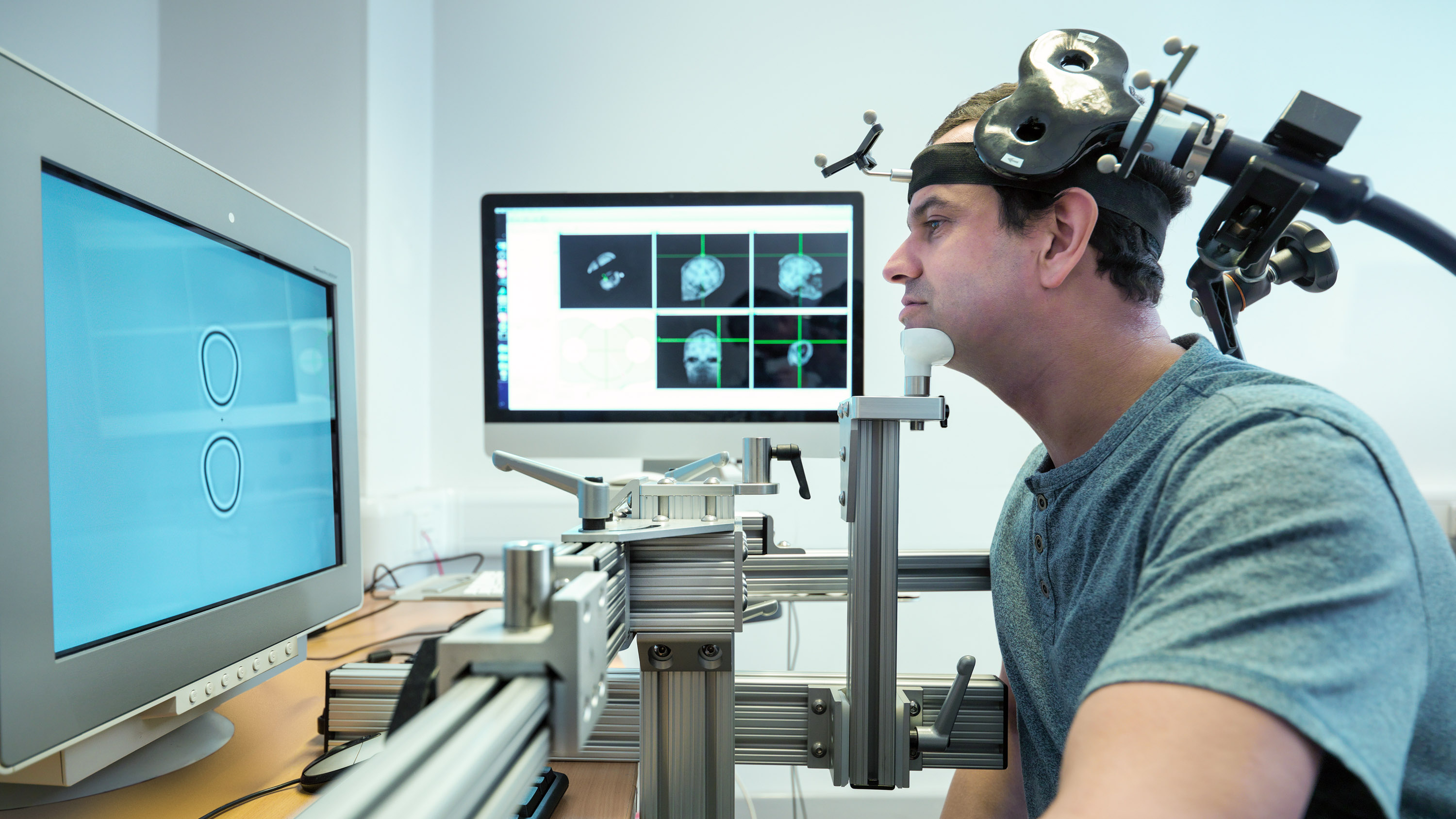 Patient in transcranial magnetic stimulation (TMS) experiment