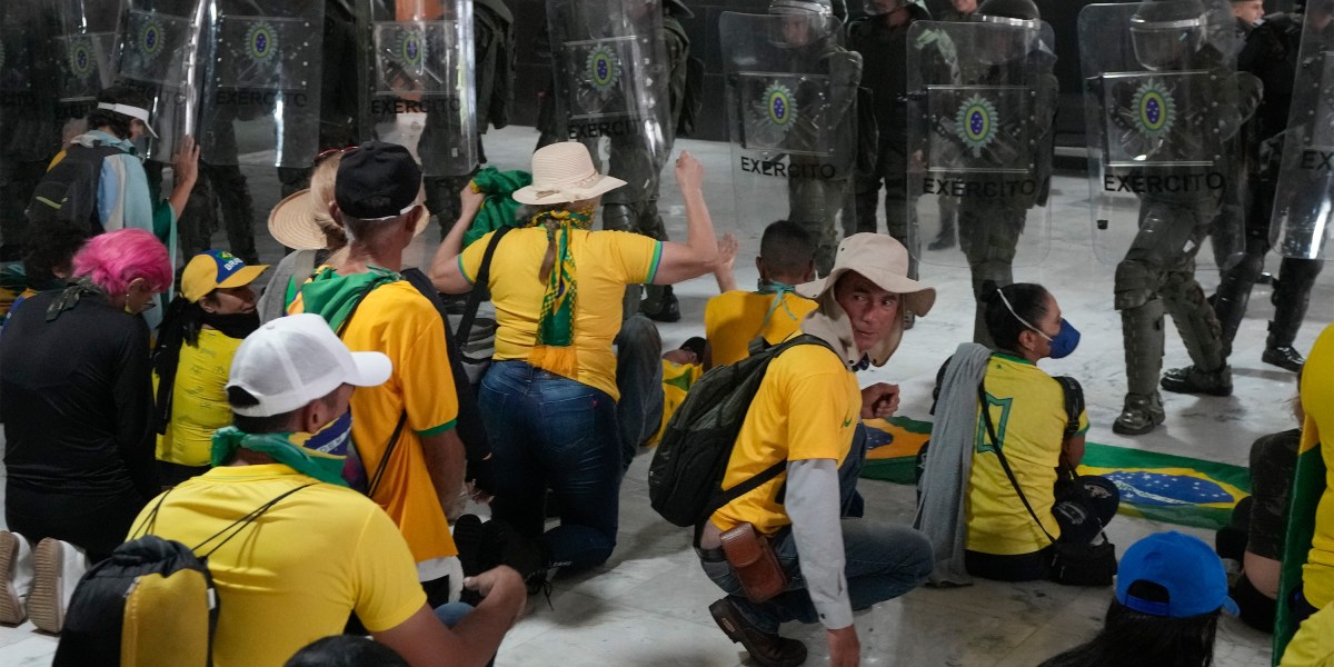 The Download: ID’ing rioters in Brazil, and shooting for the moon thumbnail