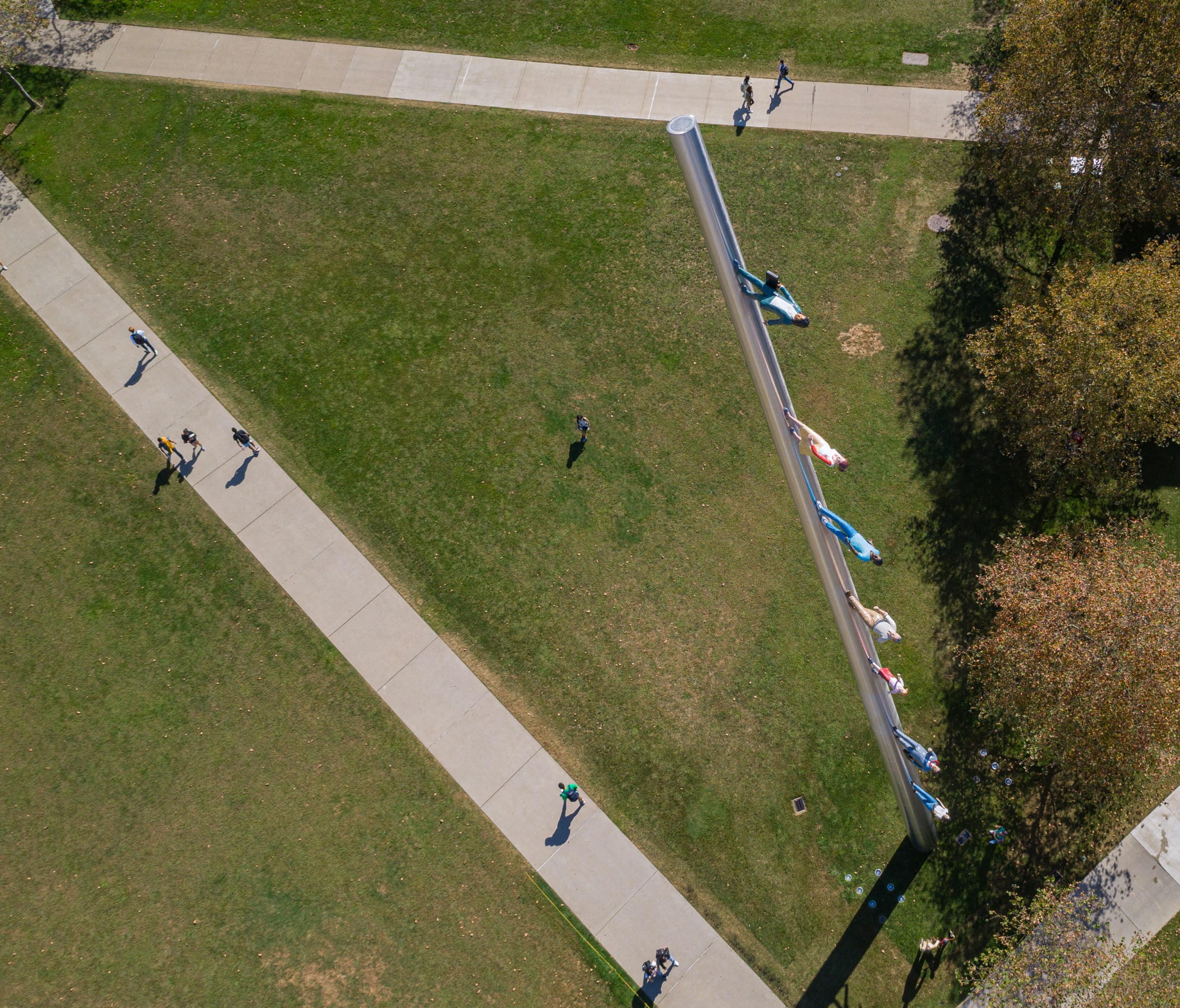 aerial view of students walking past the Walk to the Sky Monument in Pittsburgh Carnegie Private University