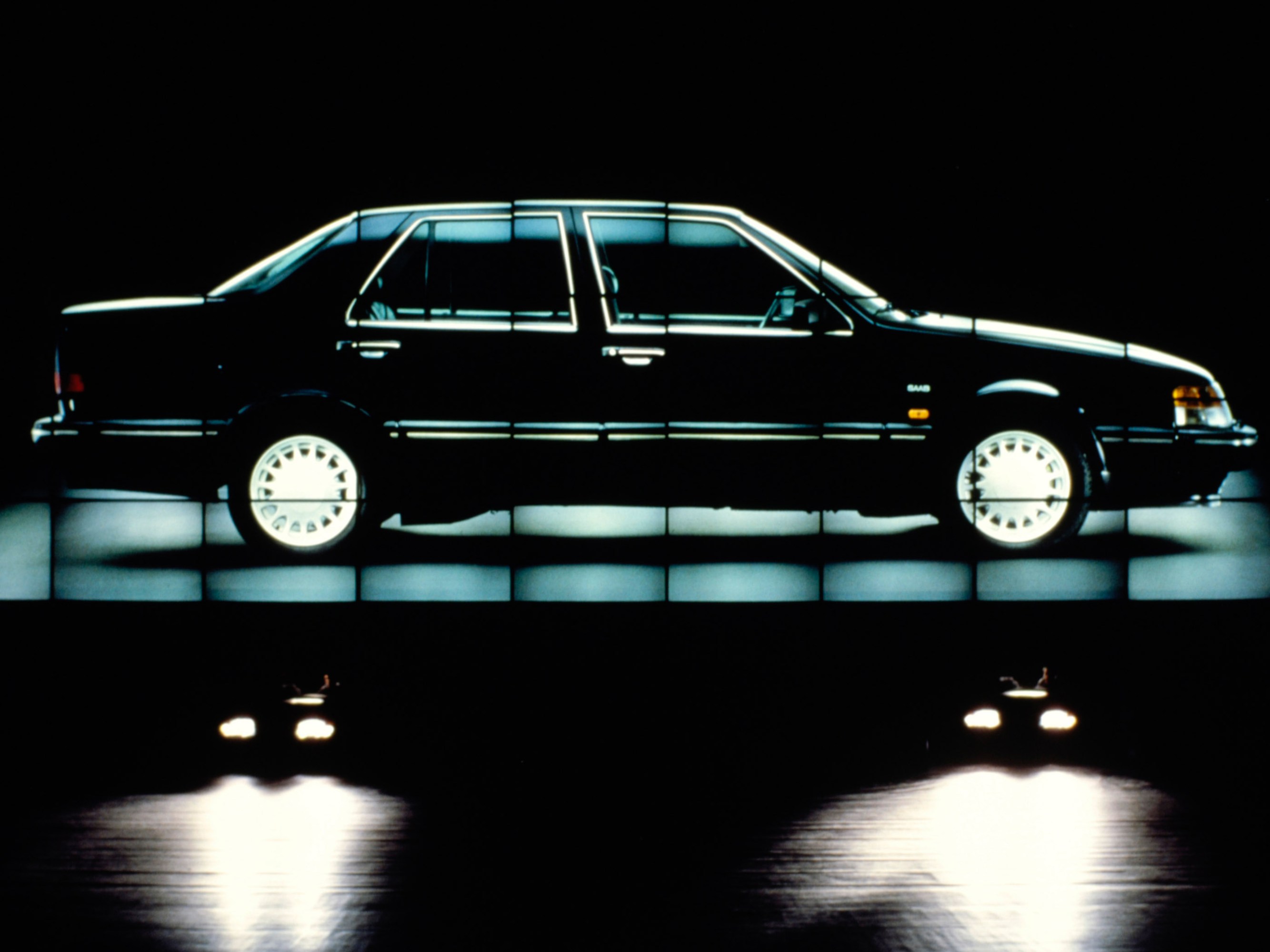 a 1988 Saab car on stage