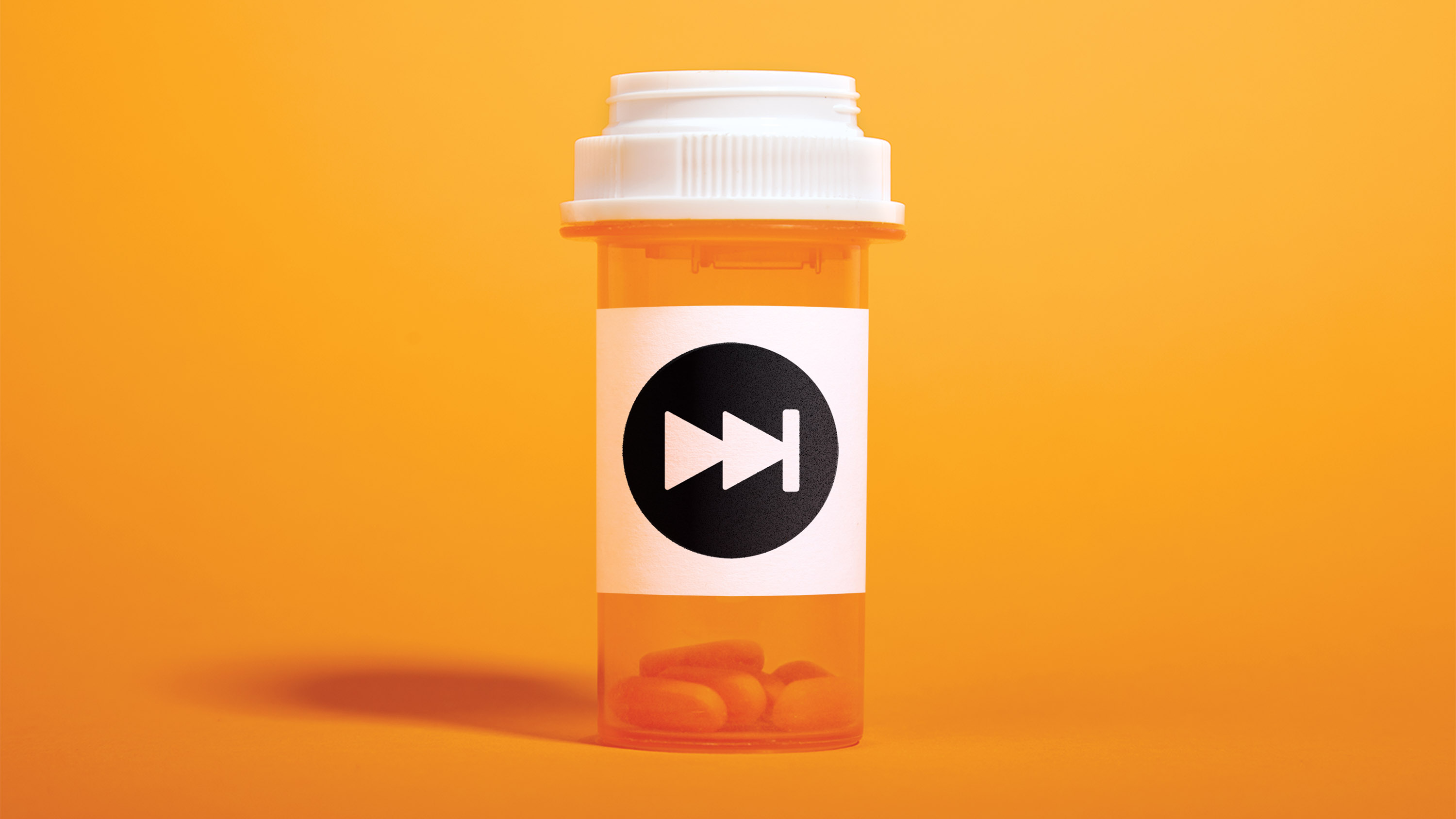 a bottle of pills with a &quot;fast forward&quot; icon on the label