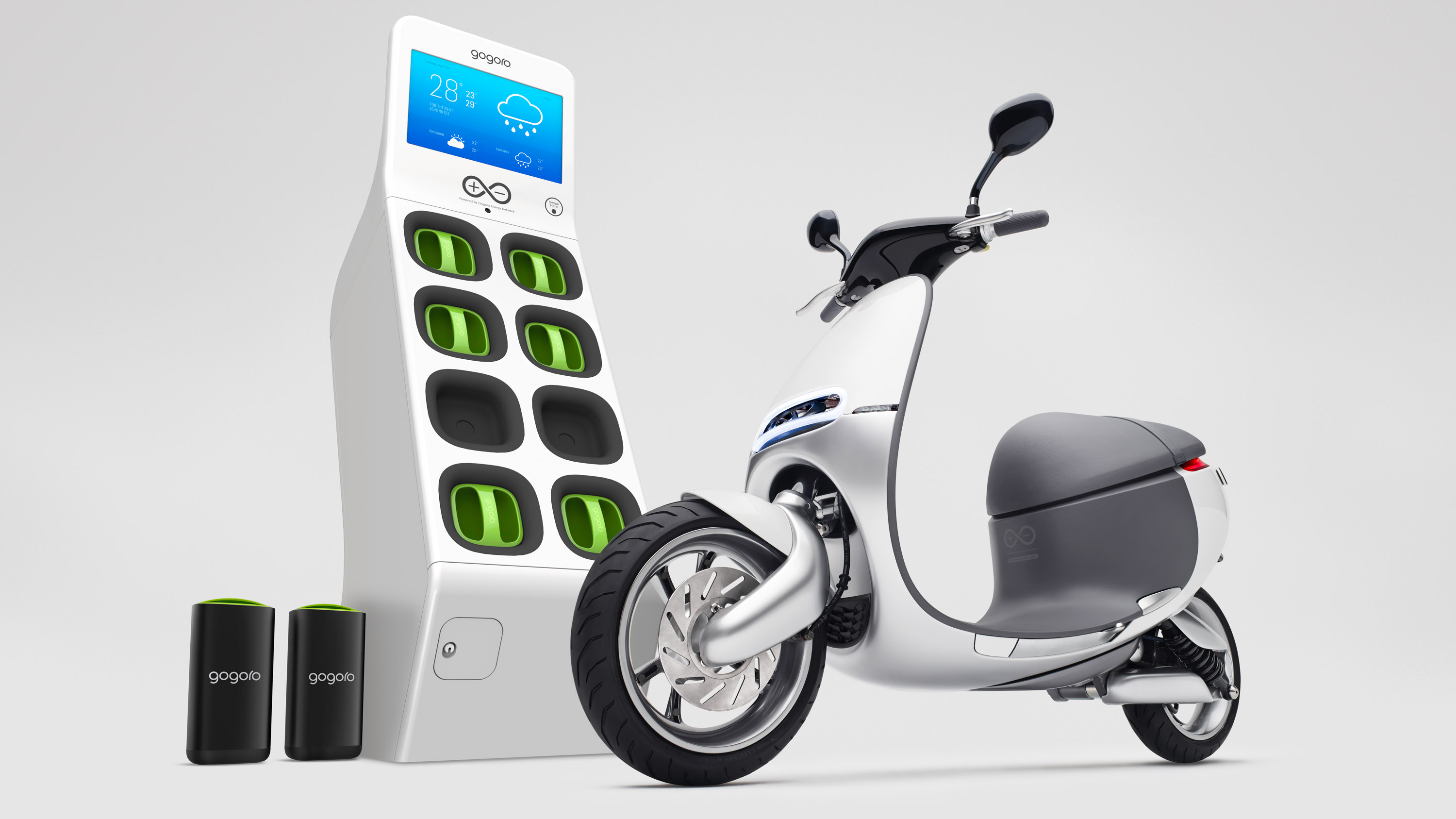 a gogoro scooter, GoStation and batteries