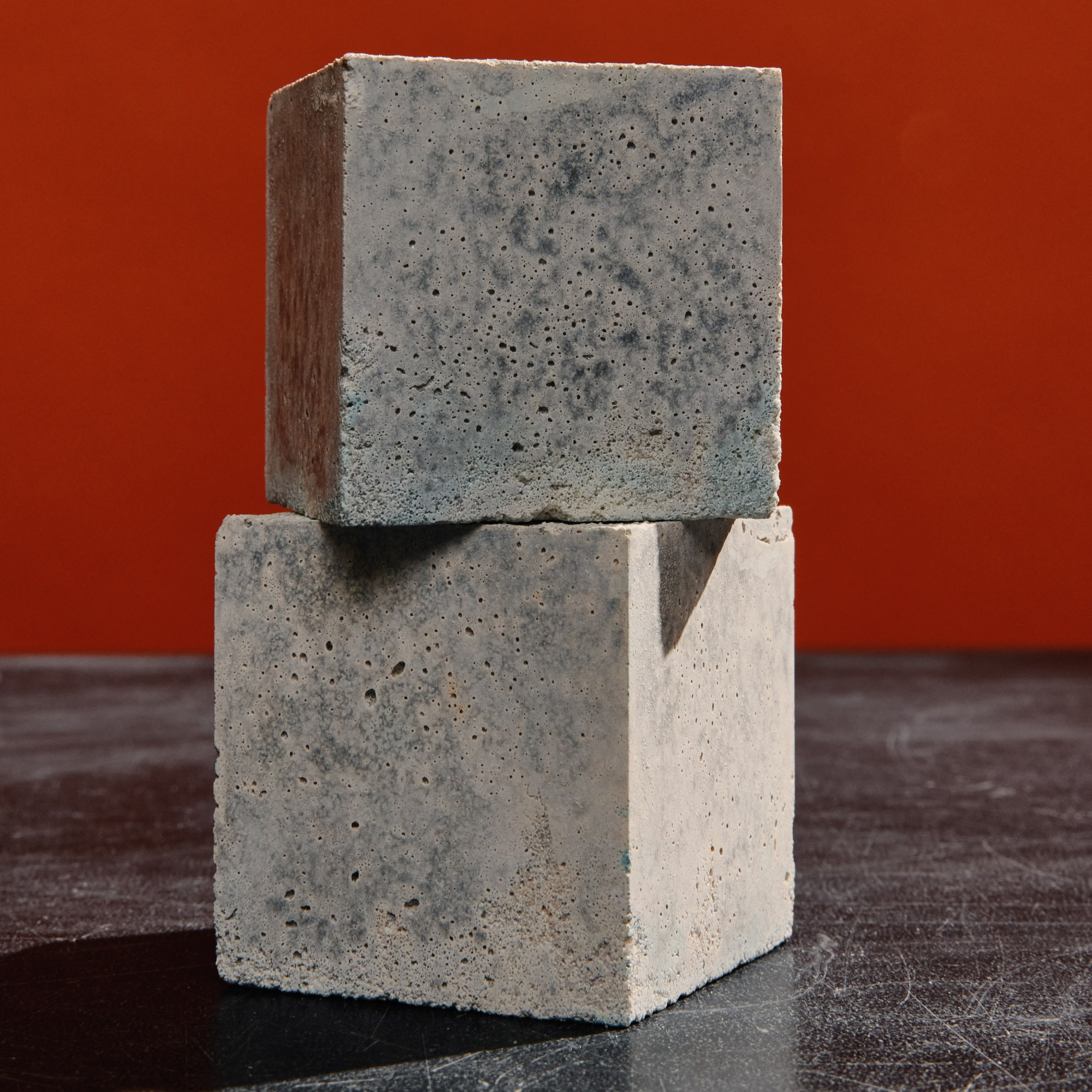 two cubes of sublime concrete stacked 