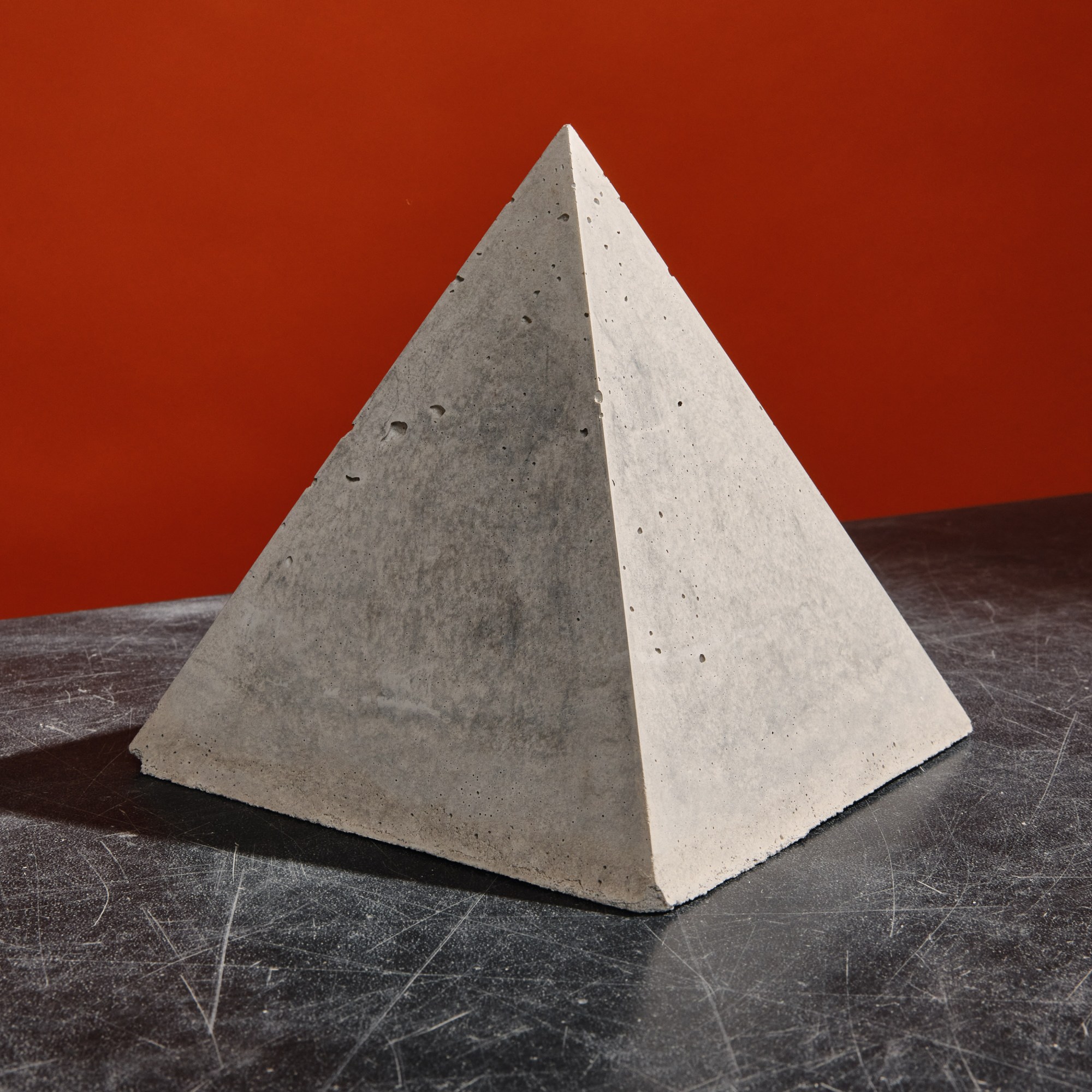 Cured cement in a pyramid shape