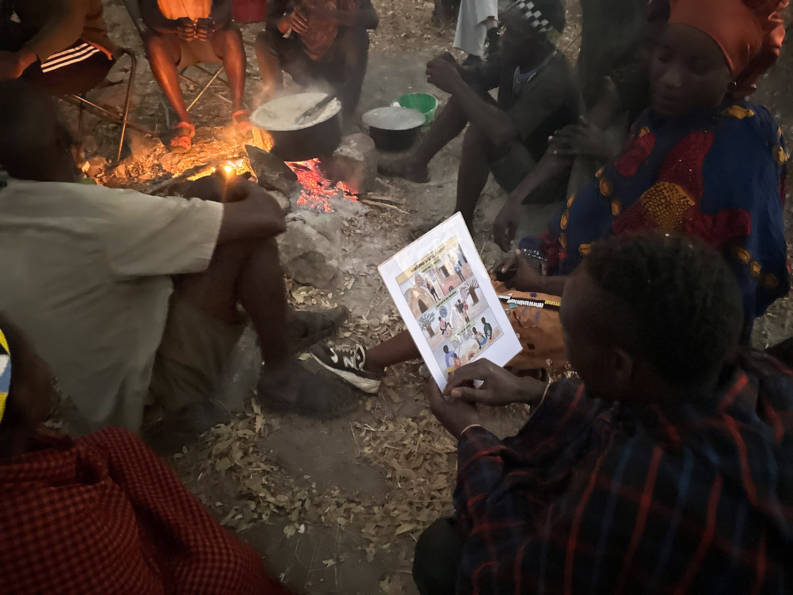 a Hadza looking at the infographic 