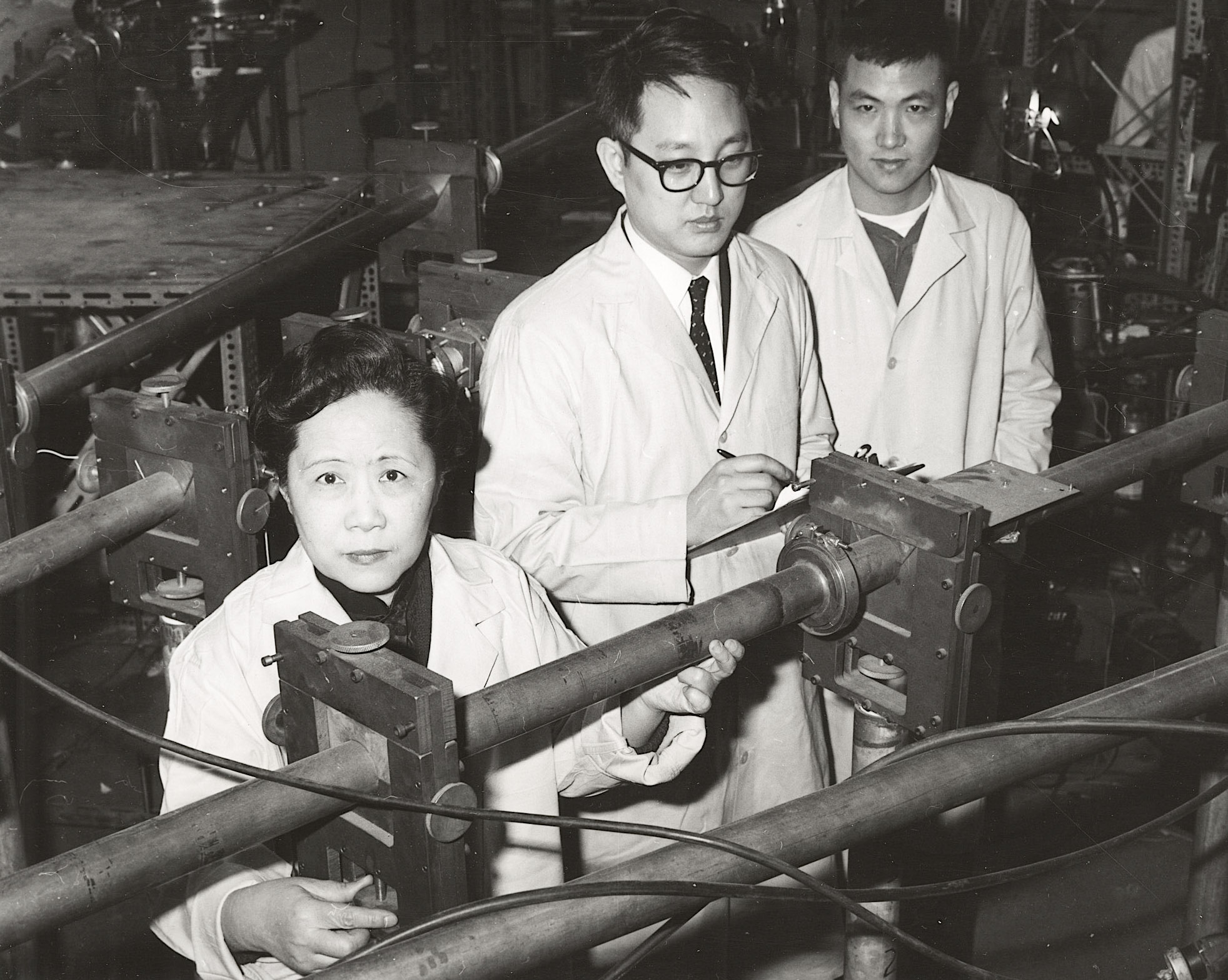 Dr. Chien-Shiung Wu (left) and her associates, Dr. Y.K. Lee and L.W. Mo