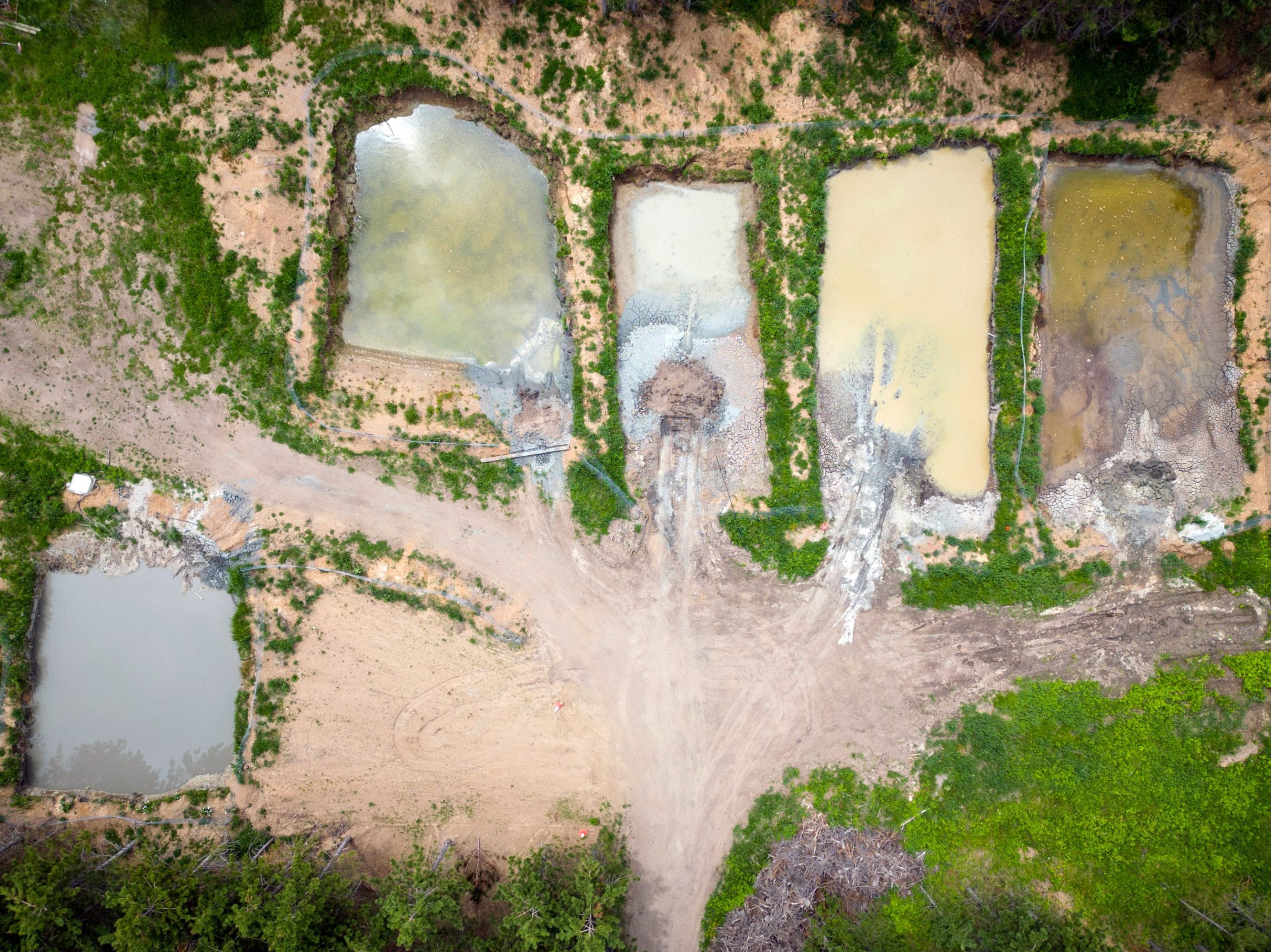 aerial view of four sump ponds