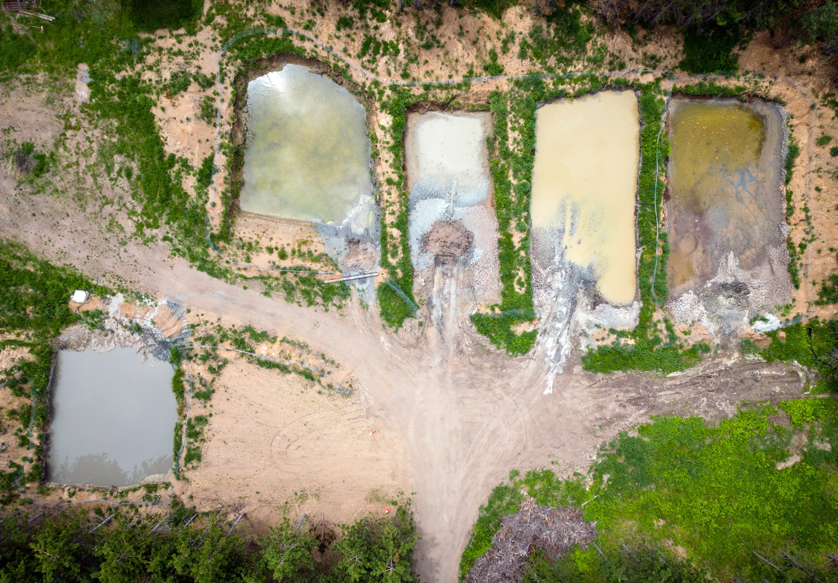 aerial view of four sump ponds