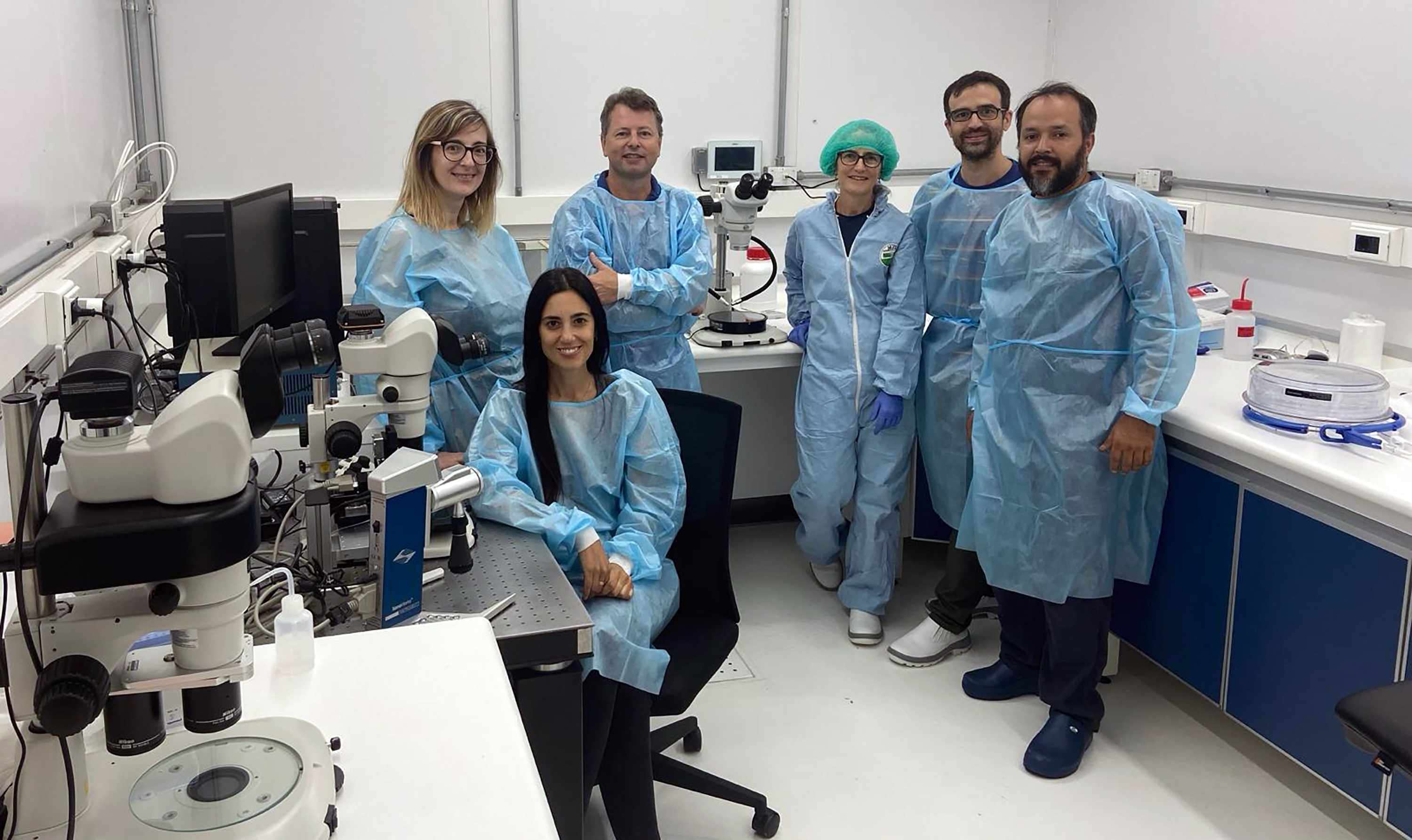 The scientific team in Uruguay poses in a lab.