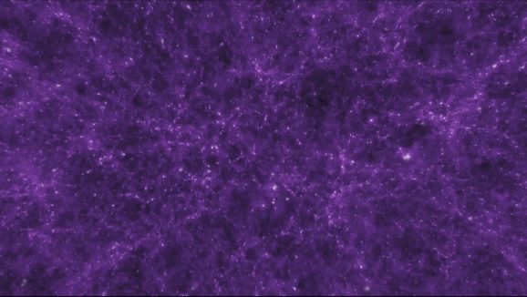 Una visualización de la red cósmica, la estructura a gran escala del universo. Cada nudo brillante es una galaxia entera, mientras que los filamentos violetas muestran material entre ellos.