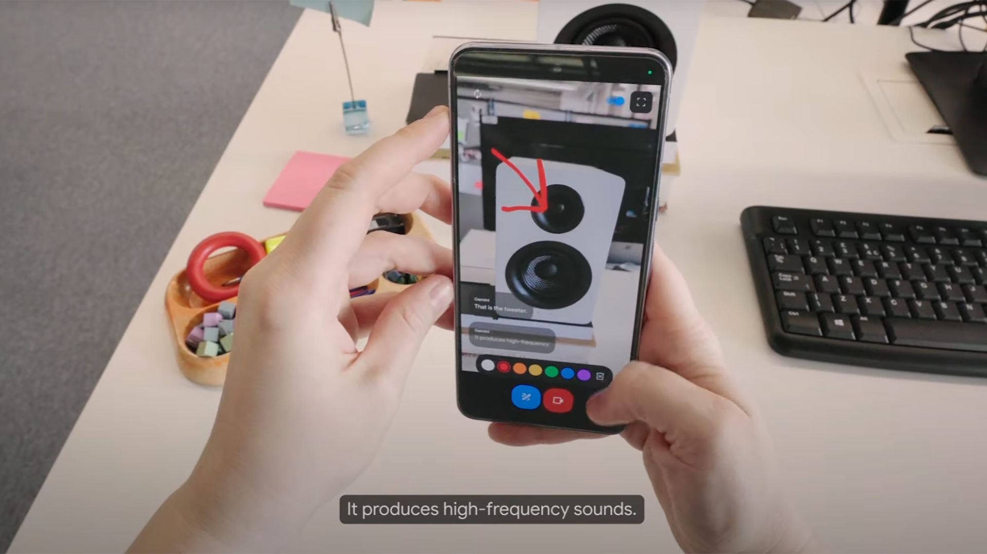 screenshot from Astra demo where user draws a red arrow on the phone screen where the phone&#039;s camera is showing the top of a speaker on a desk in the room, and Astra responds by saying the tweeter &quot;produces high-frequency sounds.&quot;